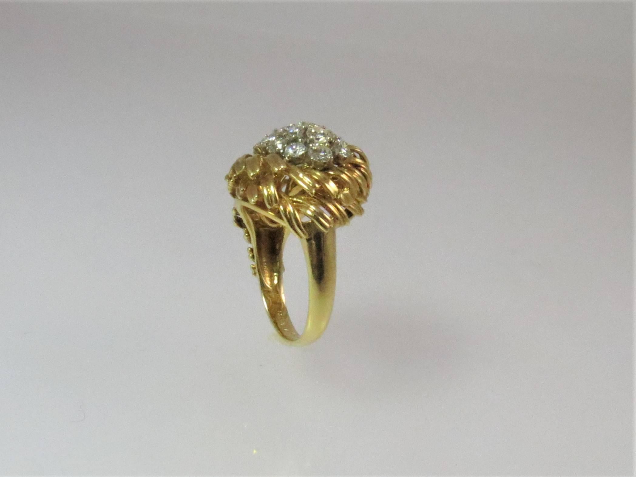 18K yellow gold diamond cluster ring, set with 21 full cut round diamonds weighing 1.03cts, F-G color, VS clarity 
Finger size 6.5, may be sized