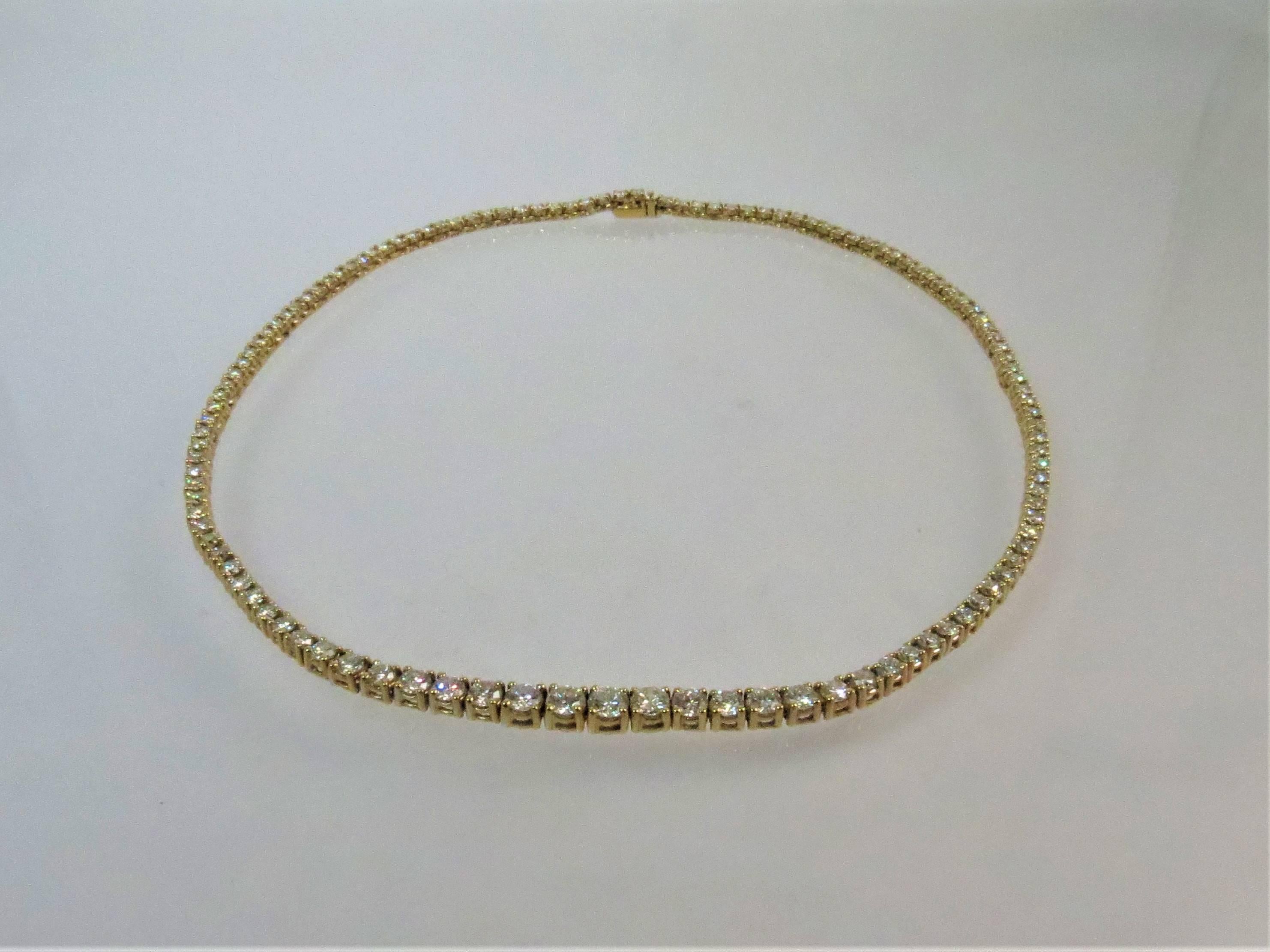 Gorgeous 14K yellow gold graduating diamond necklace, prong set with 120 full cut round diamonds weighing approximately 8cts total, graduating from .30cts to .5ct,  H-I color, VS-SI1 clarity.