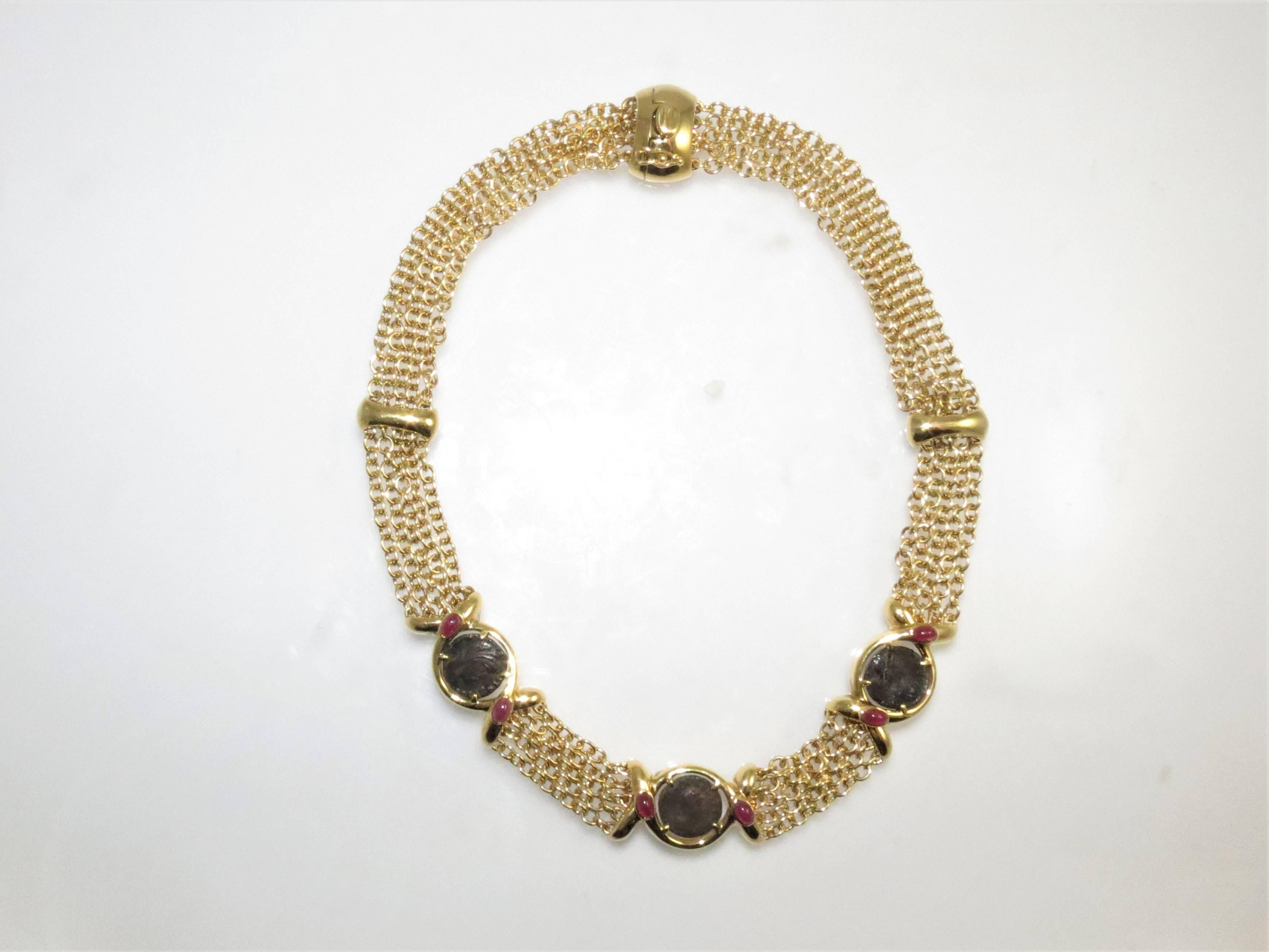 18K yellow gold, five strand necklace with three Ancient Roman coins and 6 cabochon rubies weighing approximately 1.20cts total