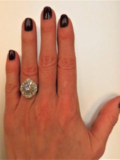 Platinum Round Diamond and Tapered Baguette Cocktail Ring