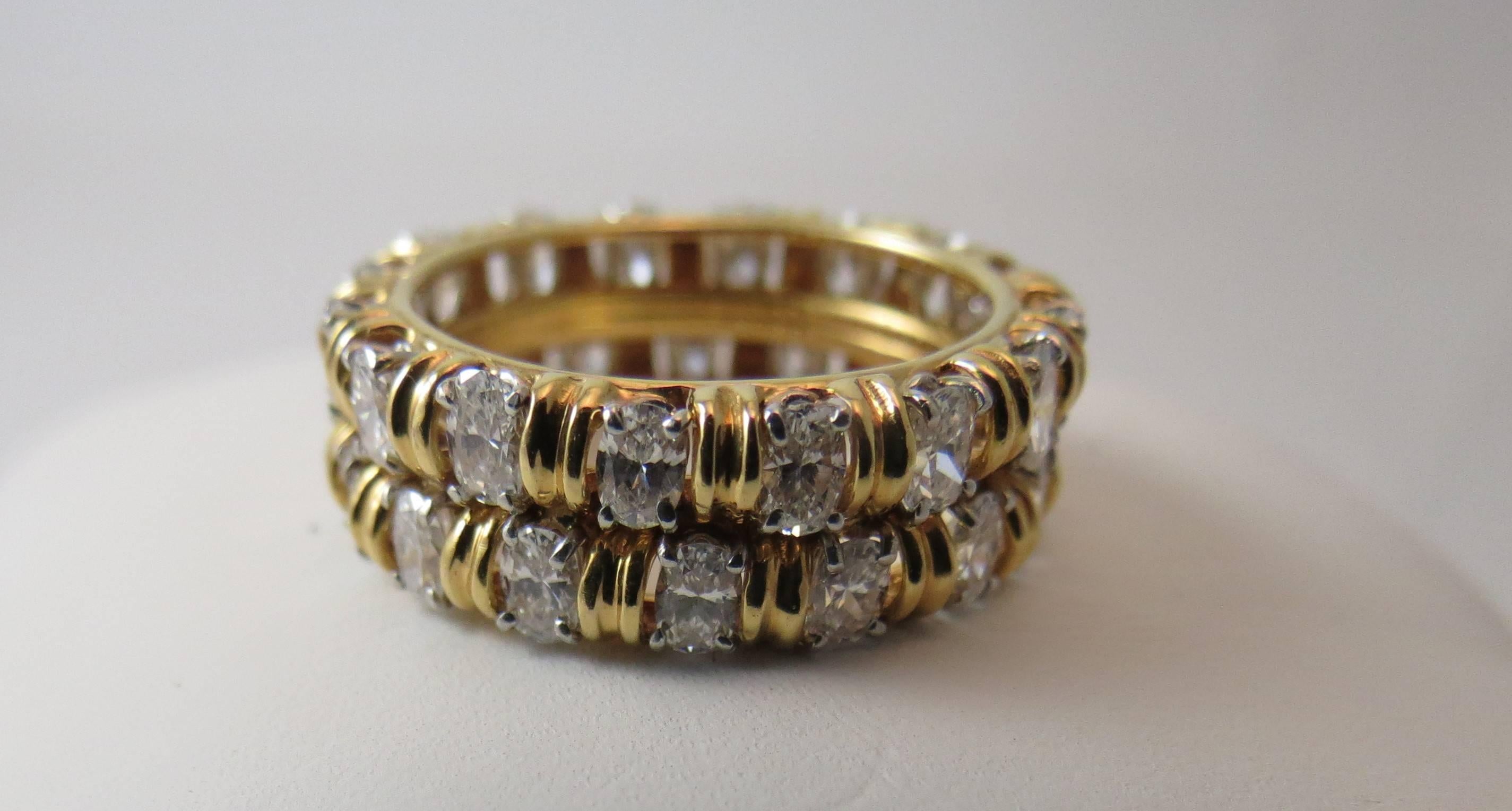 Oscar Heyman 18K yellow gold and platinum double row eternity band set with 32 oval diamonds weighing 2.35cts, F color, VS clarity
Finger size 7
May be sized
Currently retails for $16450