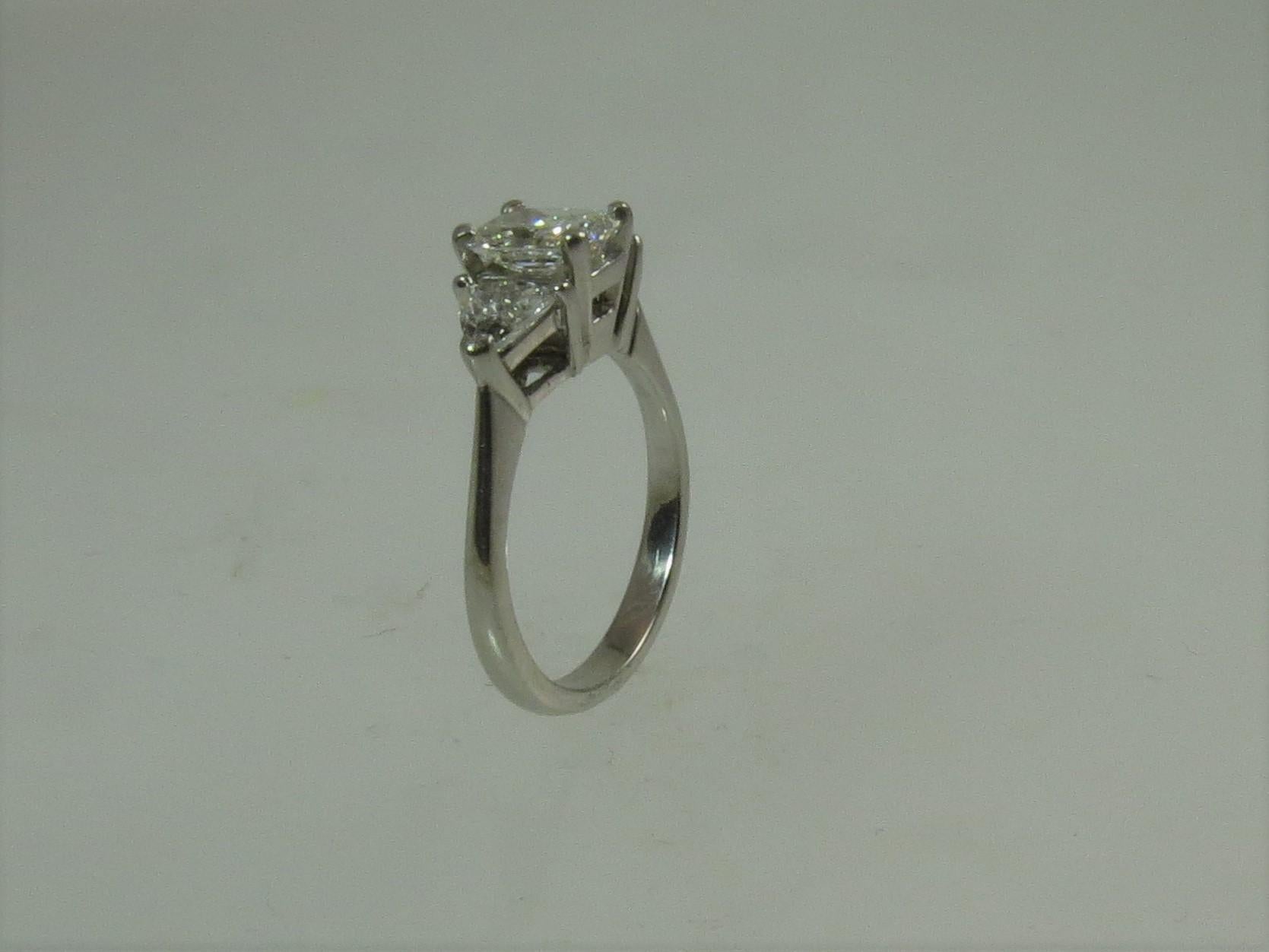 Women's Platinum Ring with Radiant Cut Diamond and Diamond Trilliants