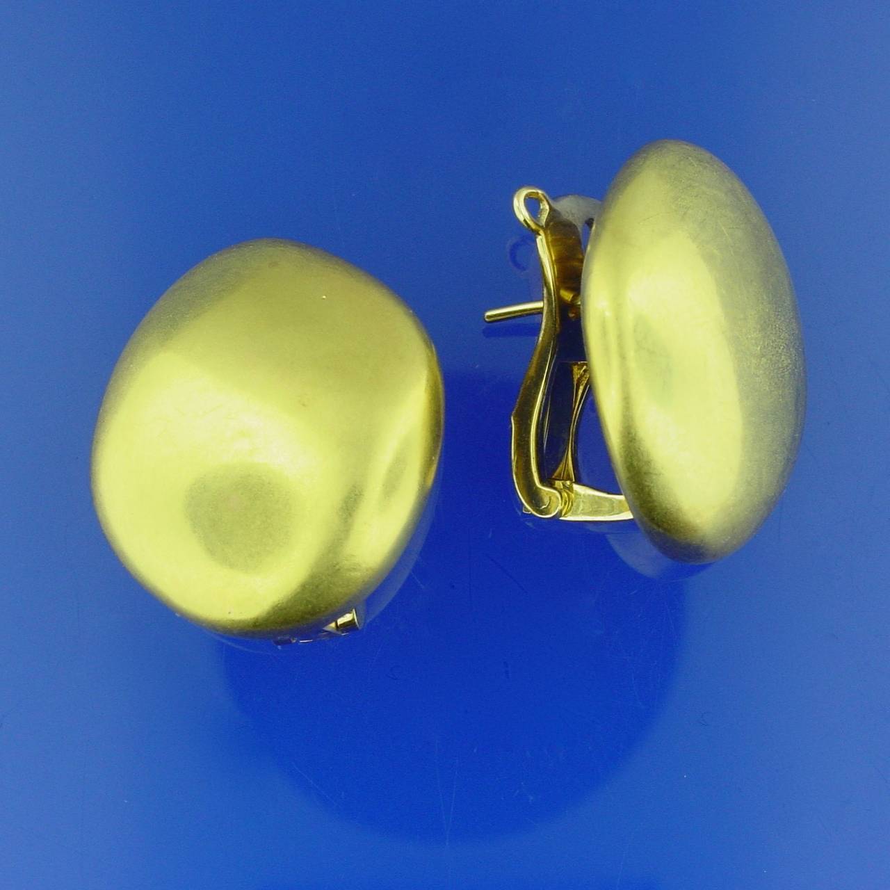 A Pair of 18 Karat Brushed Yellow Gold Pebble “les Galets” Earrings by James Taffin de Givenchy, signed Taffin. With maker's mark, numbered TF598 and inscribed “les Galets”. With original suede pouch.