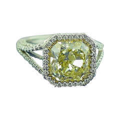 A Fancy Yellow Diamond and Platinum  Ring