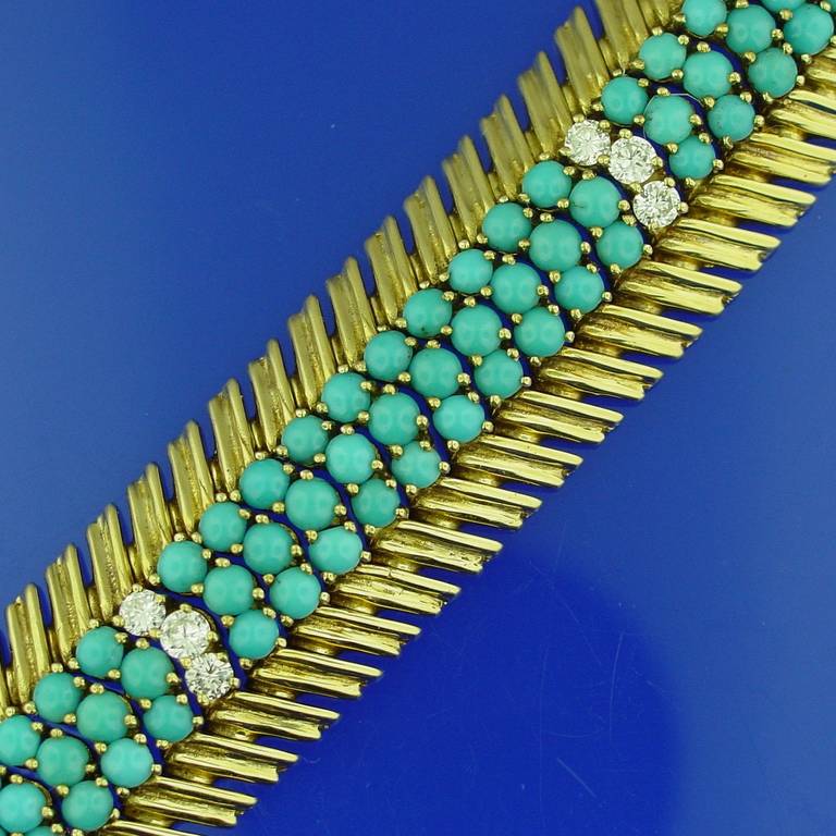 A Turquoise and Diamond Bracelet Mounted in 18 Karat Yellow Gold by Ben Rosenfeld.  With maker's mark BRLd, and London Hallmarks for 1966. With a total diamond weight of approximately 1.55 carats. 6 3/4” in length.