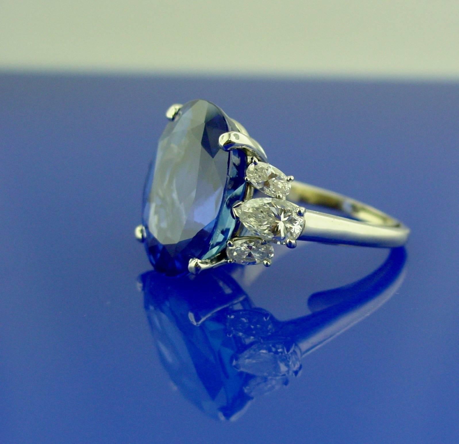 A platinum sapphire and diamond ring by Oscar Heyman featuring a 17.03 oval shaped sapphire. The sapphire has an AGL certificate stating it is a Ceylon sapphire with no indications of heat treating.

With American Gemological Laboratories report #