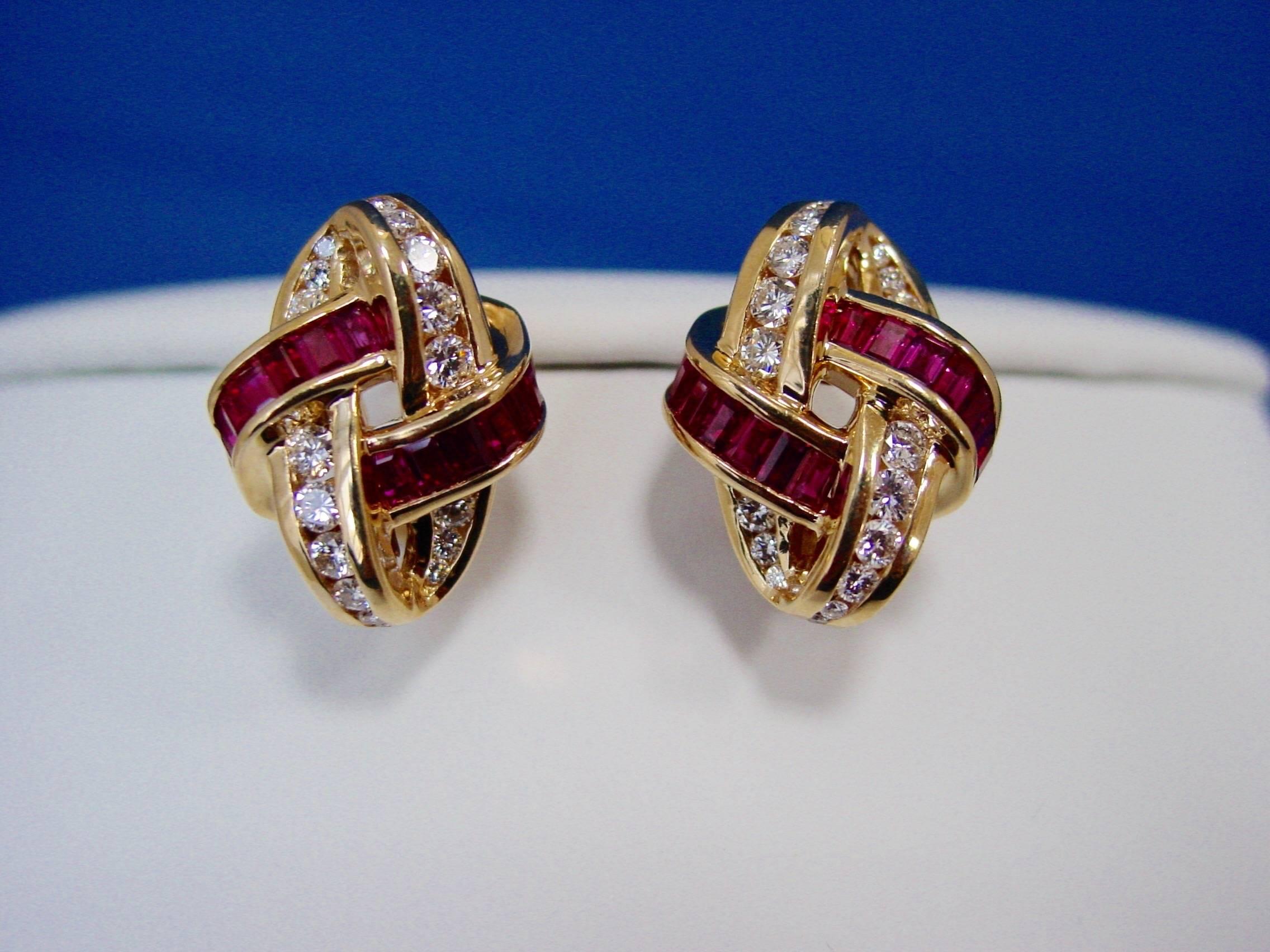 A Ruby and Diamond Brooch and Earring Set Mounted in 18 Karat Yellow Gold by Charles Krypell.  This beautifully made set features approximately 3.15  carats of channel set baguette rubies and approximately 2.35 carats of round brilliant diamonds,