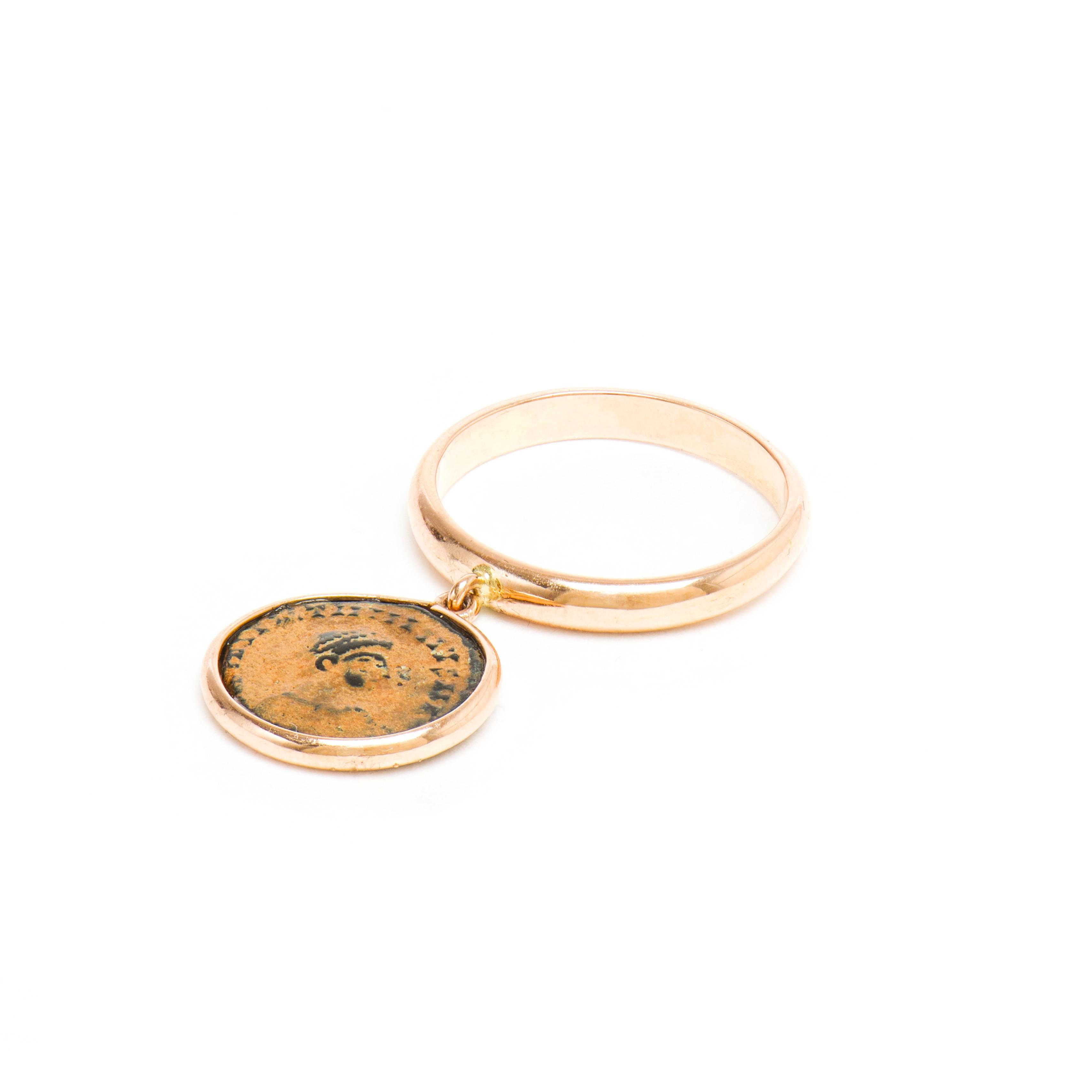 This DUBINI coin ring from the 'Empires' collection features an authentic Roman bronze coin set in 18K rose gold.

Ring sizes available: 52 (US 6)

Additional sizes may be ordered with a lead time of 2-3 weeks.

* Due to the unique process of hand
