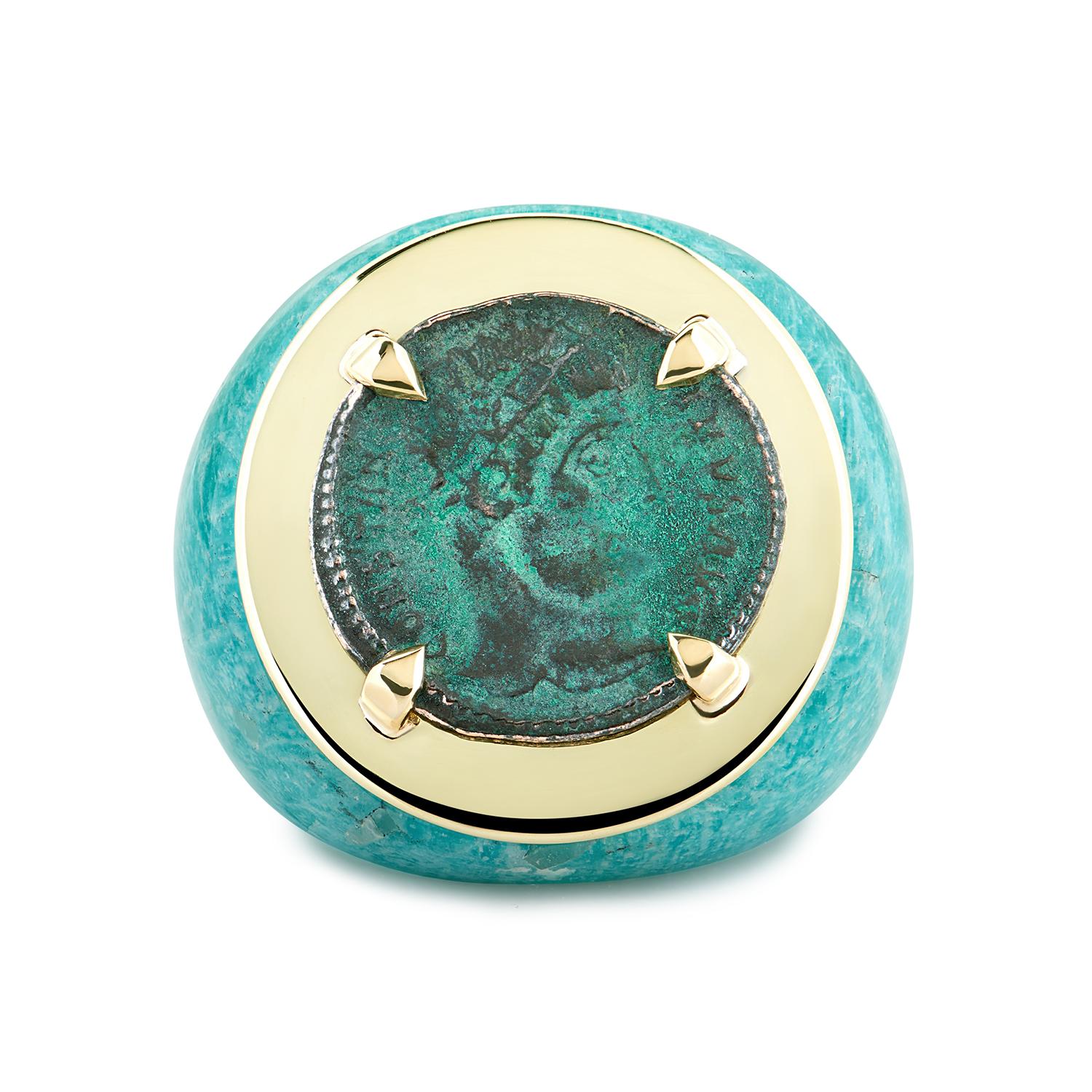 This DUBINI coin ring from the 'Empires' collection features a one-of-a-kind authentic Roman Imperial bronze coin set in 18K yellow gold and amazonite base ring.

* Due to the unique process of hand carving coins in ancient times, there may be a few