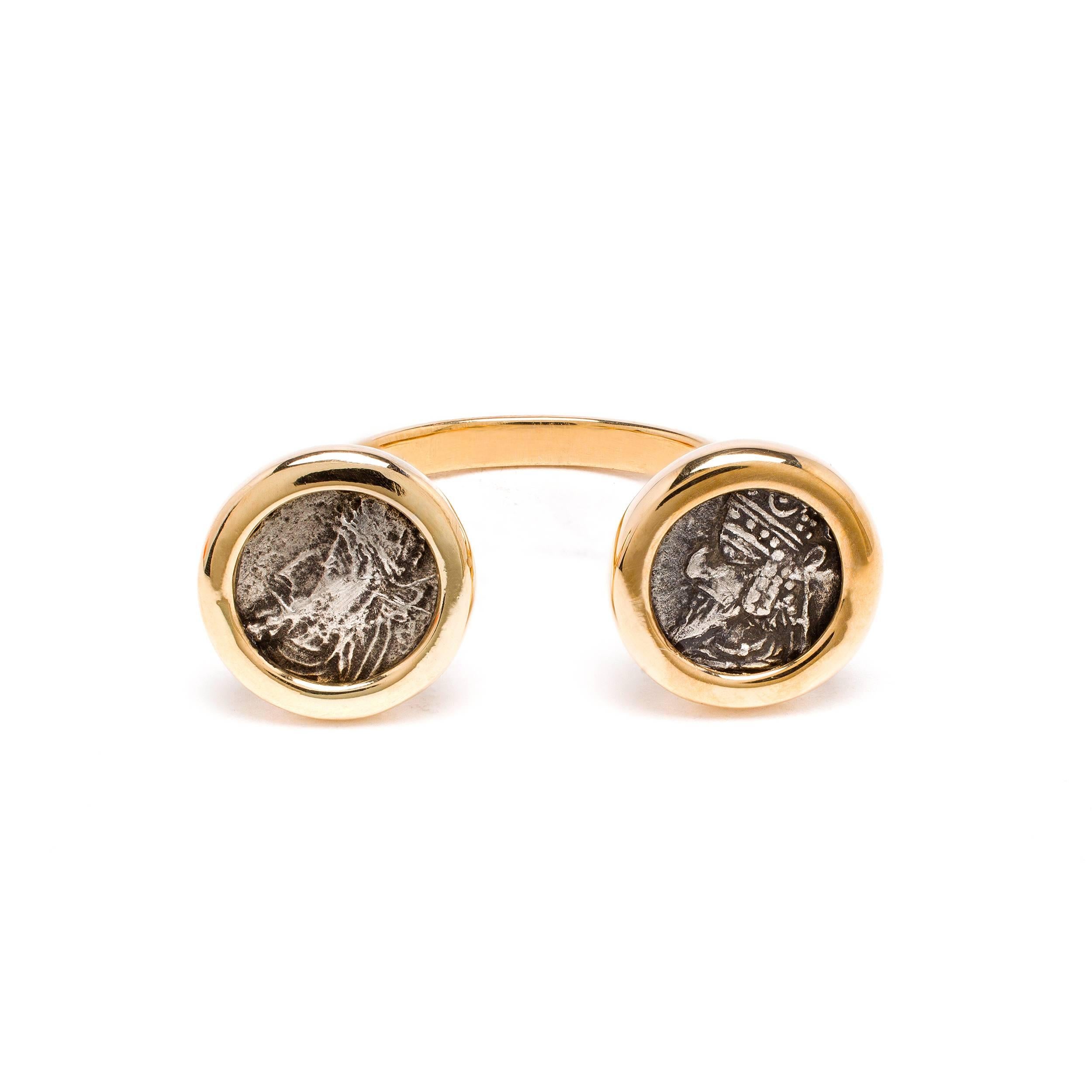 This DUBINI coin ring from the 'Empires' collection features authentic Persepolis coins minted circa 50 - 1 B.C set in 18K yellow gold.

* Due to the unique process of hand carving coins in ancient times, there may be a few stylistic differences