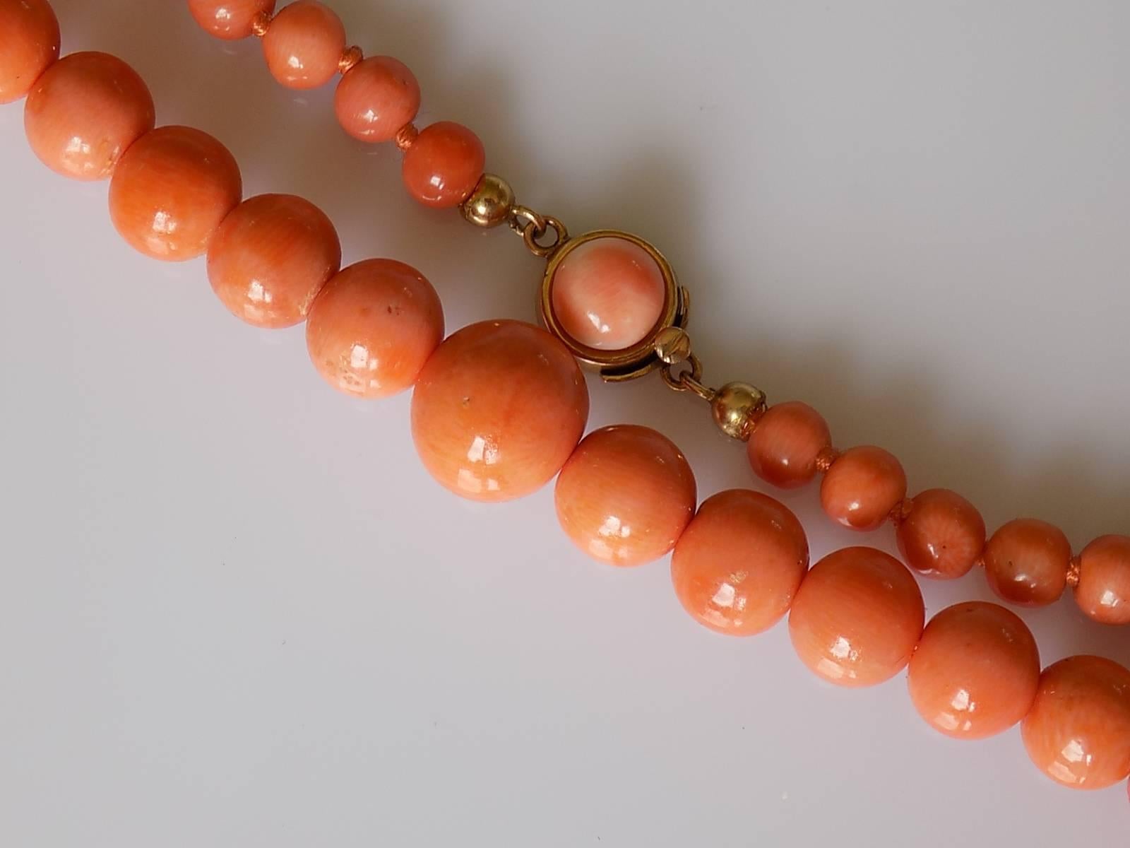 A Beautiful Victorian c.1890 Genuine Coral beads necklace on 18 Carat Yellow Gold Push In clasp. The coral beads with a natural flaws. Possibly French origin.
Total length including clasp 22 in; (56cm).
Coral beads from 4mm to 10mm.
Weight