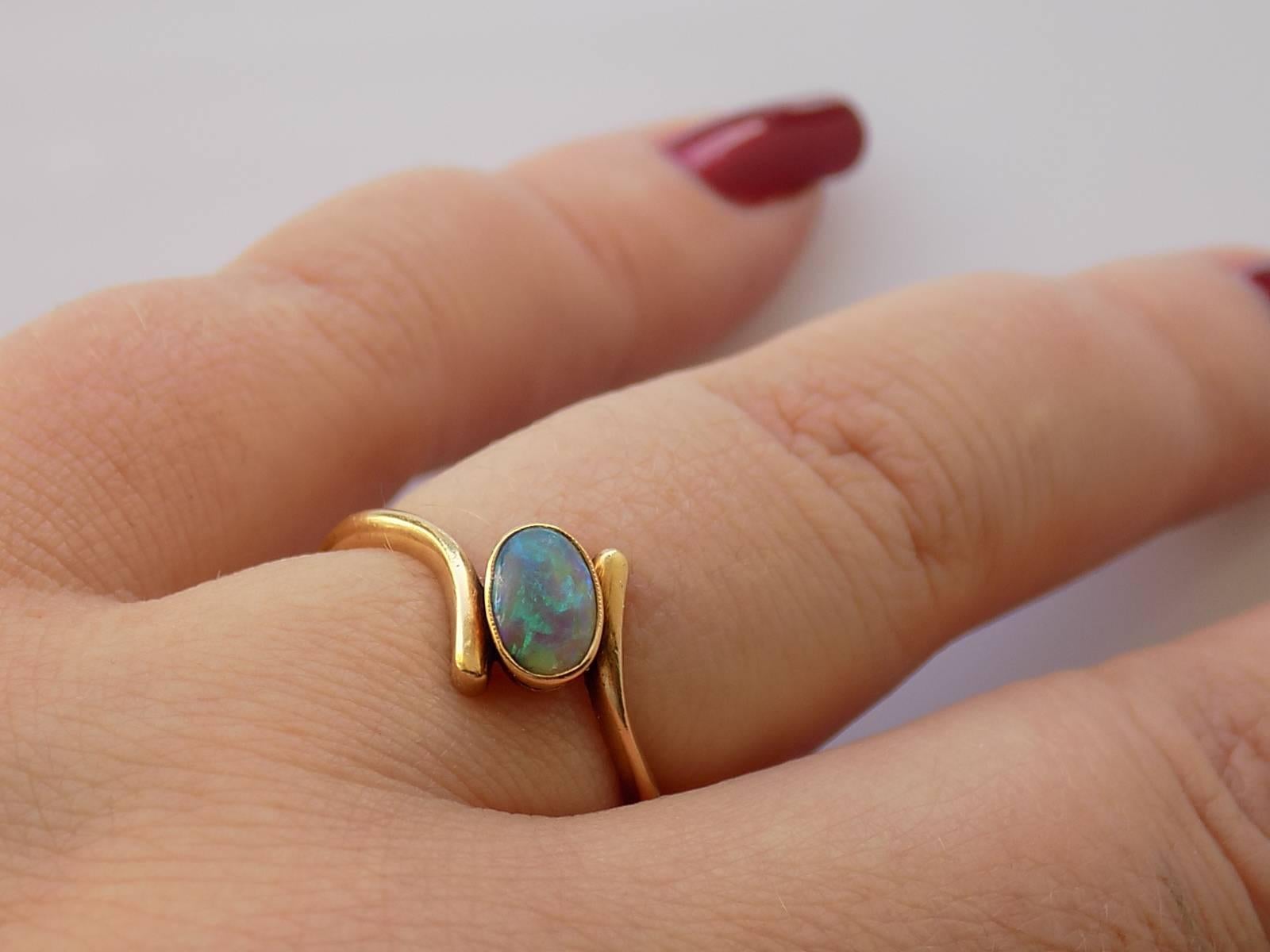 A Lovely Victorian 18 Carat Gold and solid Australian Black Opal ring. Opal are beautiful colour with a lots of green and blue splashes. English origin.
Size Q UK, 8.5 US
Opal 7mm x 5mm.