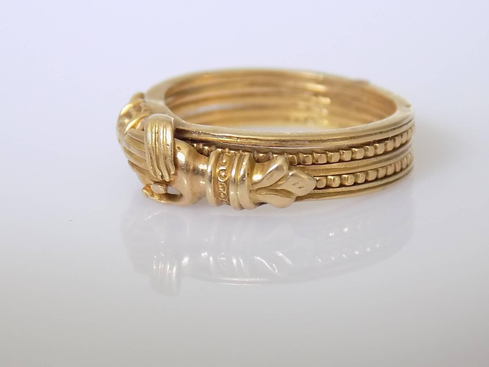 An Outstanding Georgian c.1790s 18 Carat Gold Gimmel Fede ring with beautiful details on the cuffs.  An unusual thing about this ring it`s made not of  two or three rings as traditional Gimmel rings, it`s made of five individual rings jointed