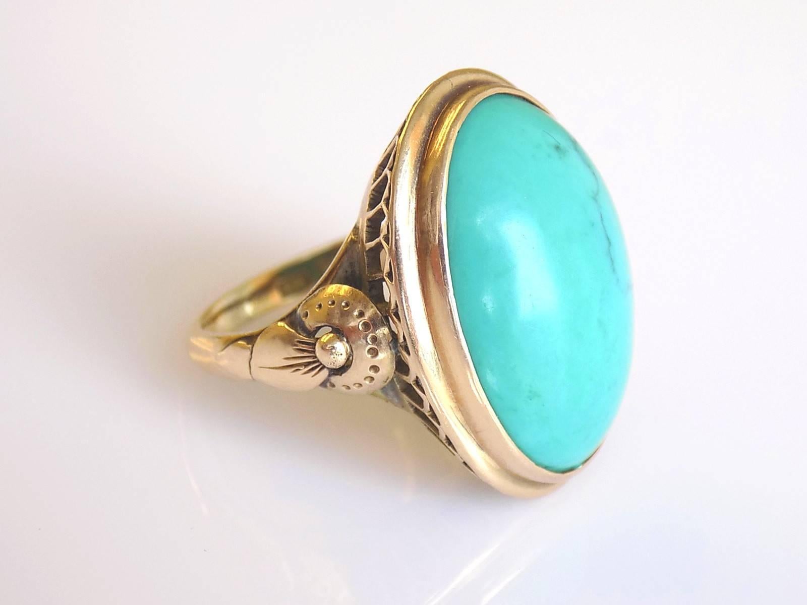 A Large Vintage c.1970s Chinese 14 Carat Gold and Turquoise cocktail ring.
Size L UK, 6 US.
Height of the face including setting 25mm (1").
Weight 8.9gr.
Marked: 14K for 14 carat gold, HK for Hong Kong.
The ring in good condition and ready to