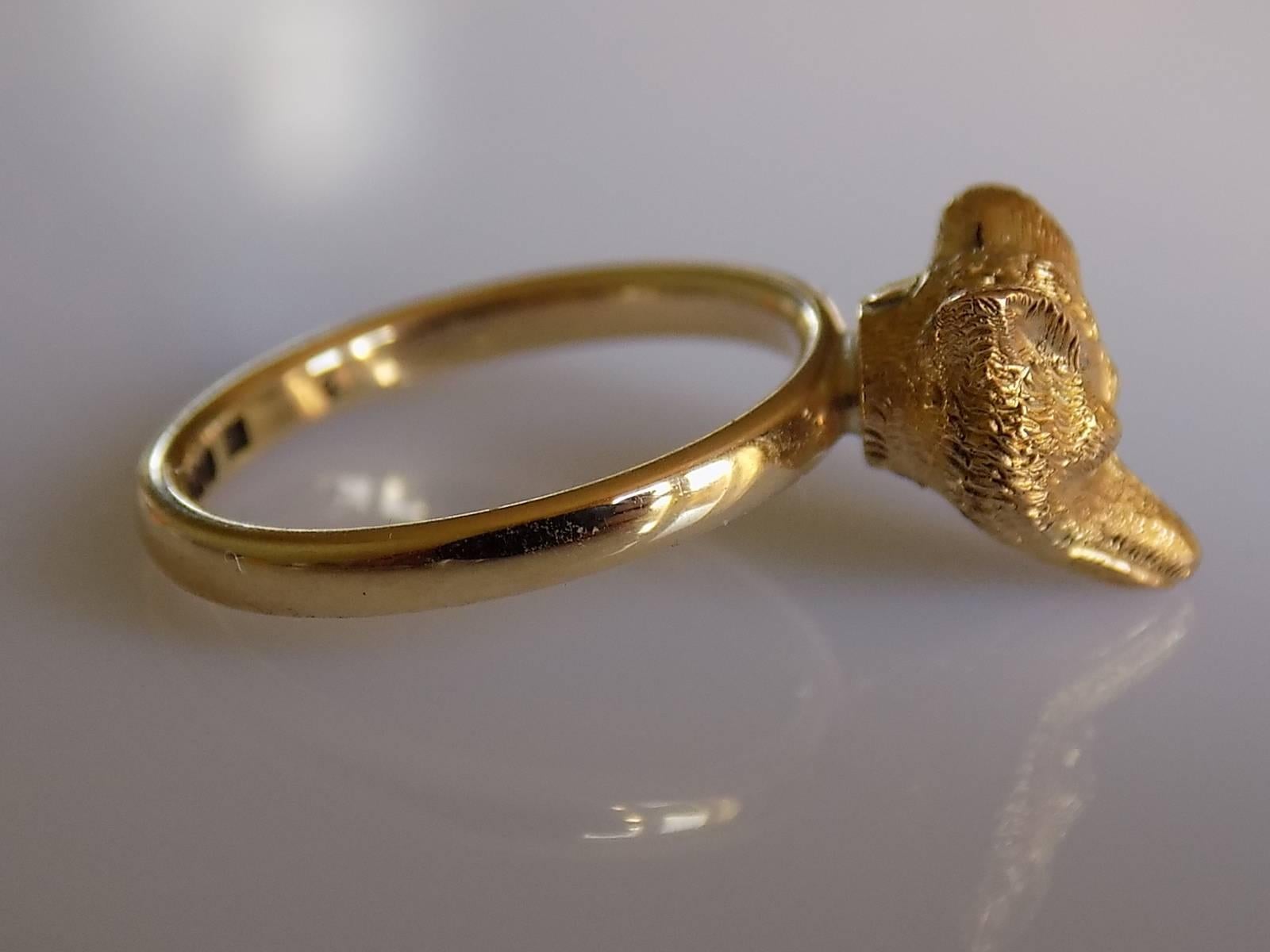 A Victorian Gold Fox head stick pin conversion ring on 9 Carat Gold shank. 
Size N 1/2 UK, 7.25 US.
Height of the face 12mm, Width 9mm.
Weight 3.5gr.
Shank fully hallmarked for 9 Carat Gold.
Very good condition and ready to wear.