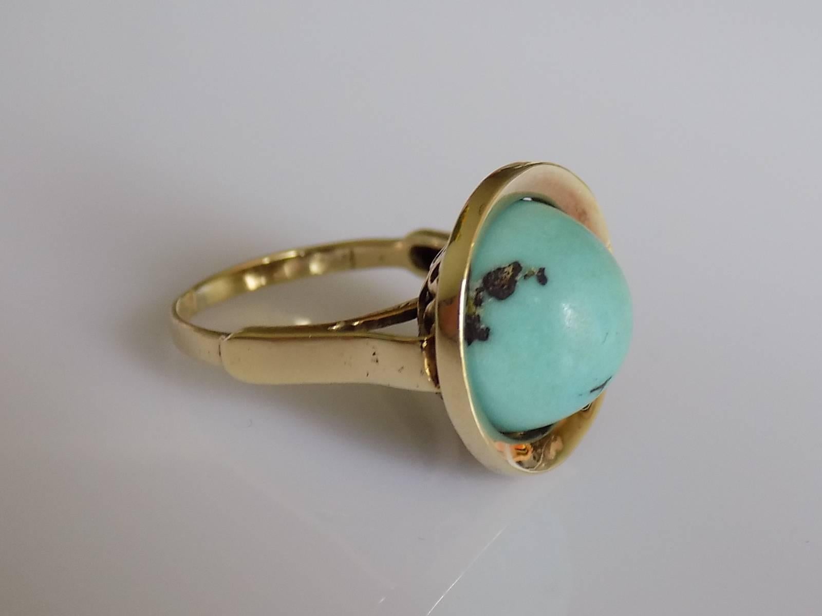 Highly Unusual Antique early 1900s 14 Carat Yellow Gold and Dome shaped Turquoise Matrix solitaire ring. Turquoise in an intricate bascket style setting. Oustanding looking ring.
Size L UK, 6 US 
Width of the face 17mm
Weight 5.9gr
Tested 14 Carat