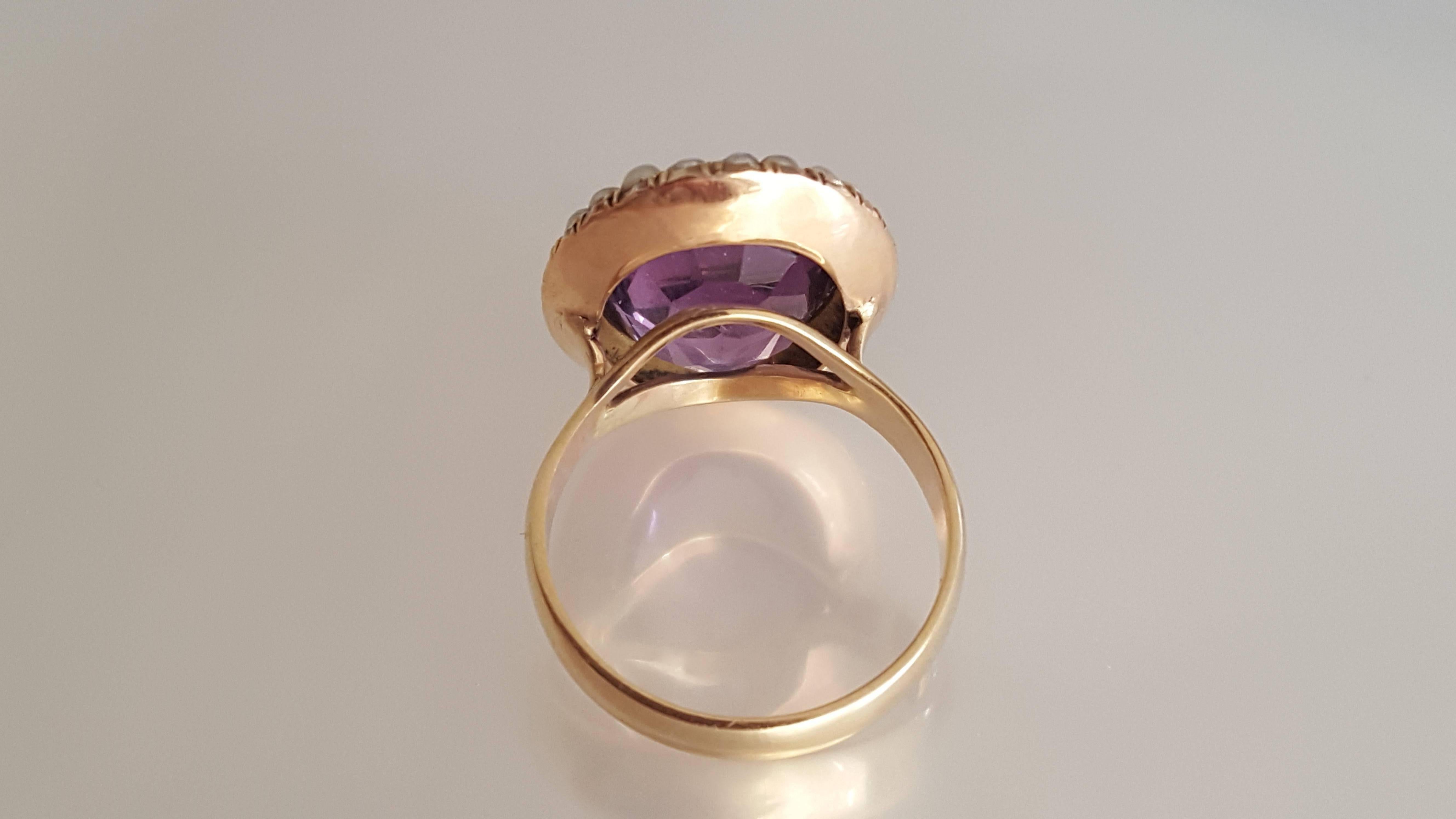 A Spectacular Antique Victorian c. 1890 9 Carat Gold Amethyst and split seed Pearl cocktail ring brooch conversion on 9 Carat Gold shank. English origin. 
Size M UK, 6.5 US.
Height of the face 21mm 
Width 15mm
Excellent condition and ready to wear. 