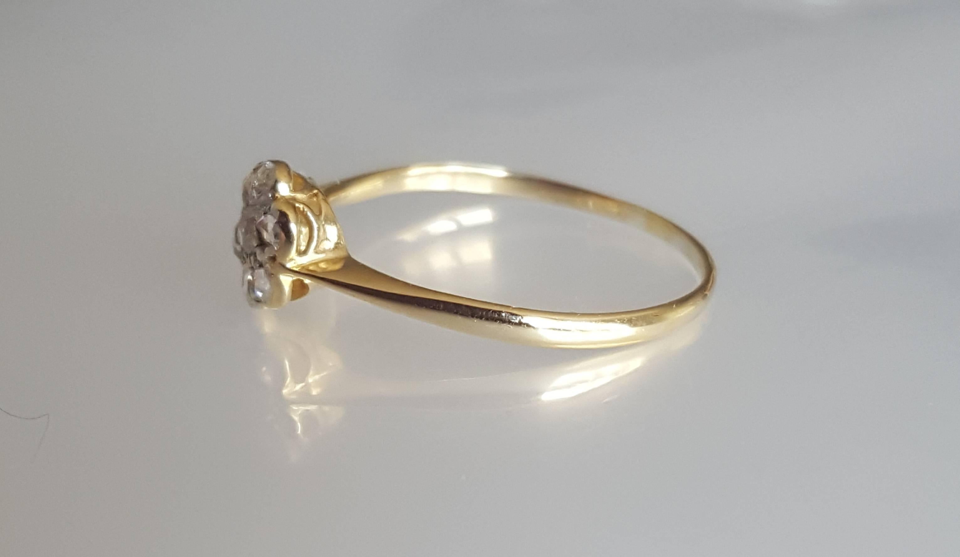 A Gorgeous Edwardian era 18CT Gold and Rose Cut Diamond cluster engagement ring. English origin. 
Size 7 US can be sized. 
Height of the face 7mm.
Tested 18 Carat Gold. 