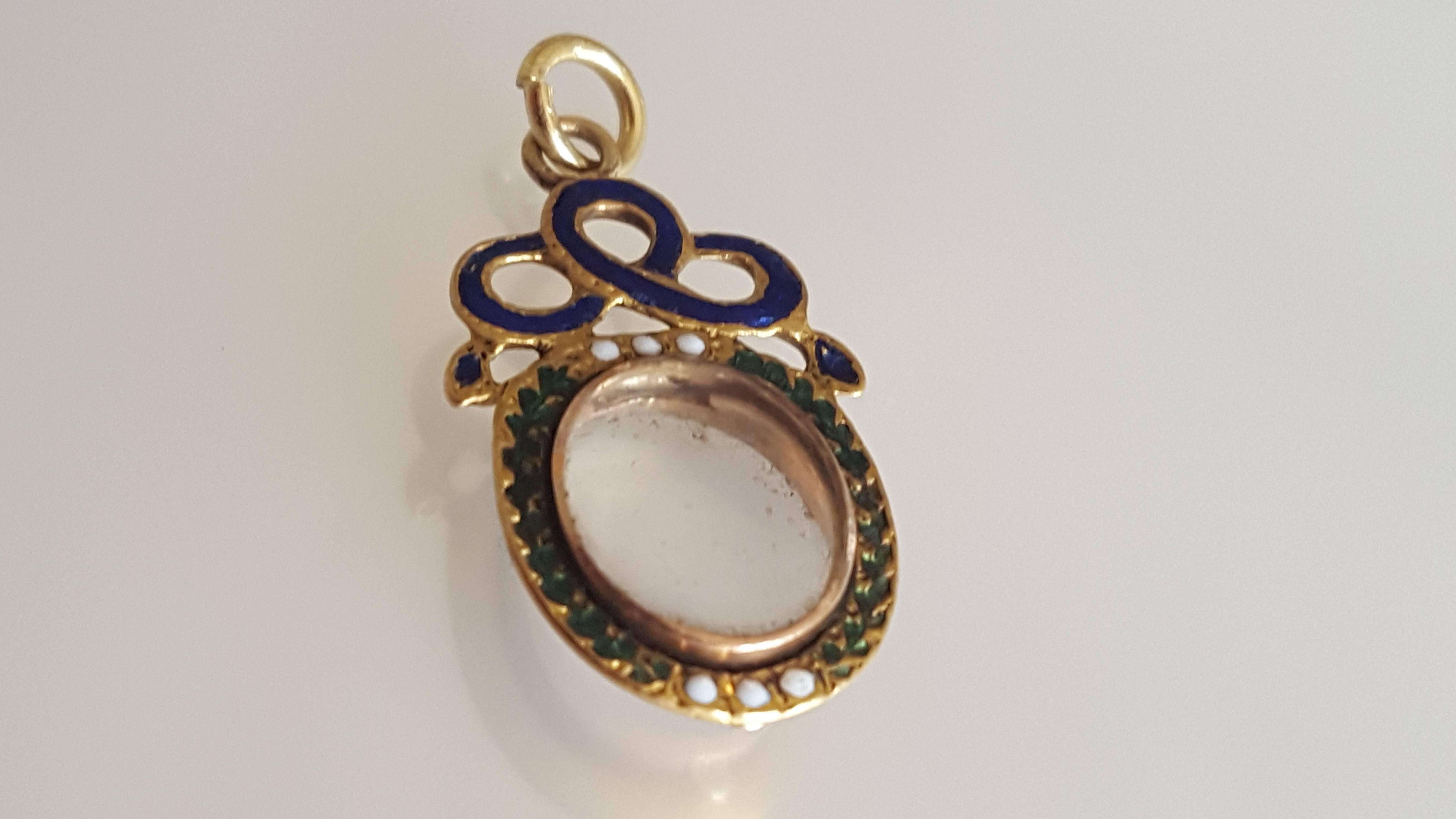 A Rare Georgian c.1700s 18 Carat Gold  and blue/green/white enameled locket pendant. English origin. 
Total drop including jump rings 25mm or 1