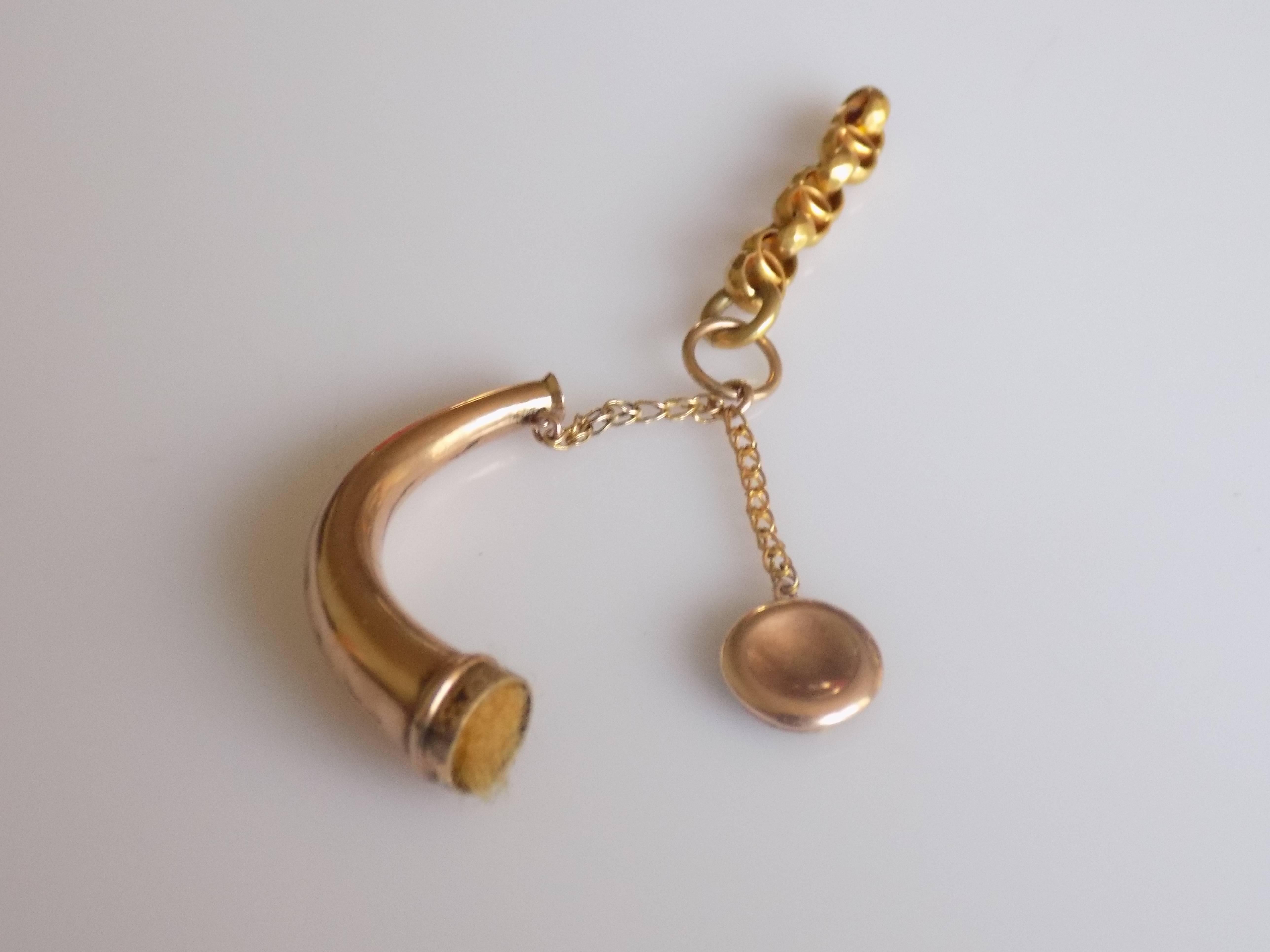 A Rare Victorian c.1870s Rose Gold Horn shaped scent bottle pendant. English origin.
Width 35mm.
Weight 2.9gr.
Unmarked.
Excellent condition for the age.