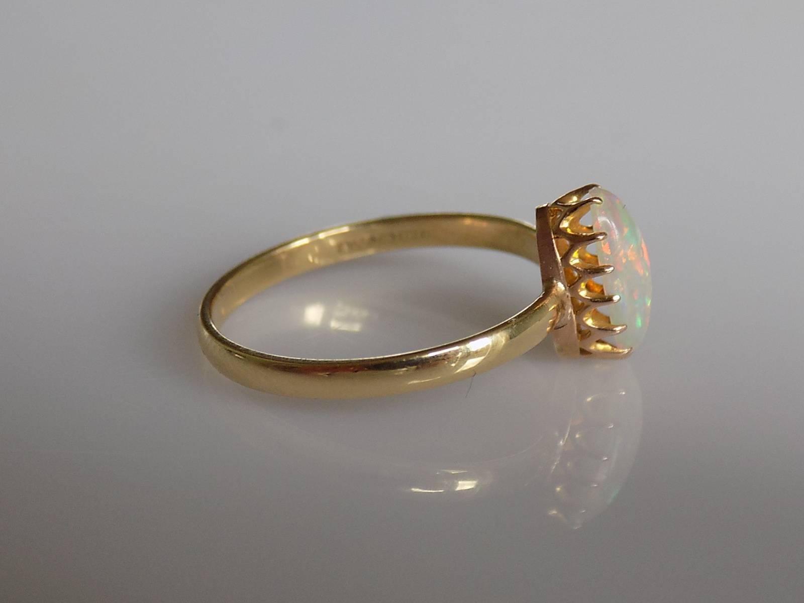 A Beautiful Victorian Fine quality Australian Opal stick pin conversion ring. The Opal in a crown style claw setting on a later 18 Carat Gold shank. English origin.
Size Q UK, 8.5 US can be sized.
Opal 10mm x 5.5mm.
Weight 2.2gr.
London hallmark for