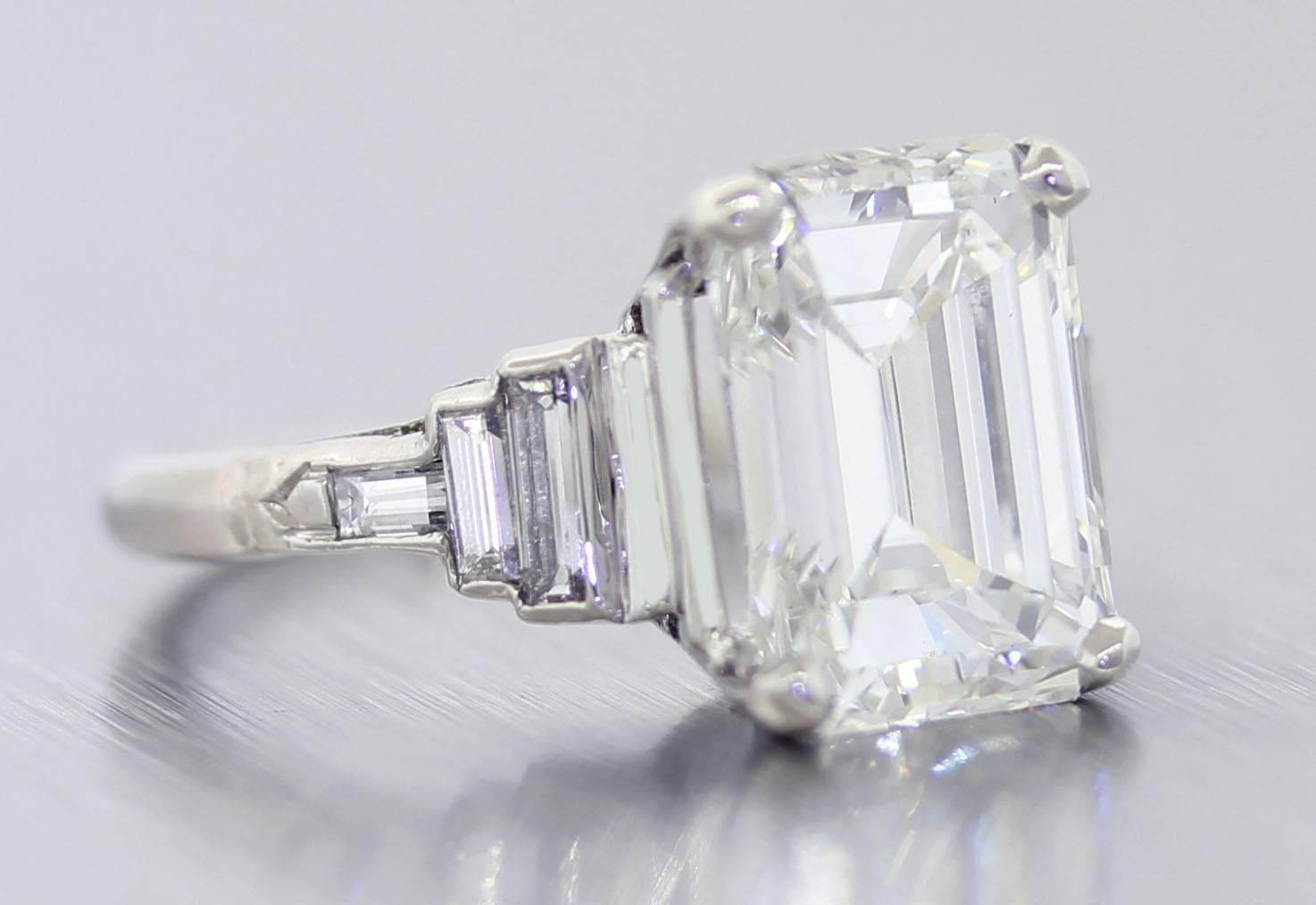 This is an exquisite platinum and 4.6 carat center diamond engagement ring. This ring's center diamond was graded by GIA; one of the most reputable diamond grading organizations in the world. The ring is a size 7.0, and is also re-sizable. Contact