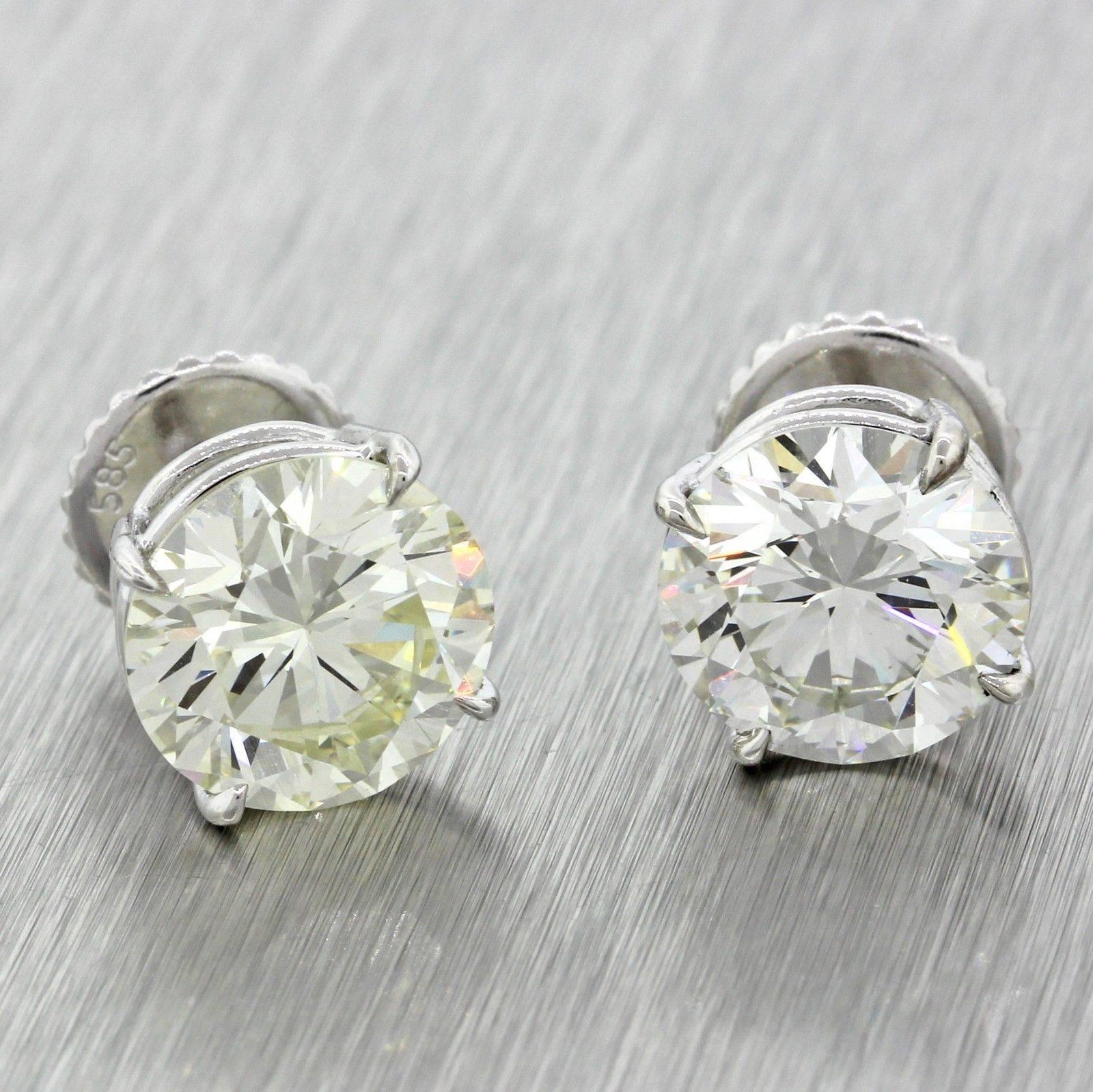 This is a beautiful pair of HUGE Modern Estate 14k Solid White Gold 7.76ctw Diamond Stud Earrings GIA EGL. It will come professionally packaged in a Collectors Coins & Jewelry gift presentation box.

Gender 	Women's
Stone Type 	GIA Diamond - Round