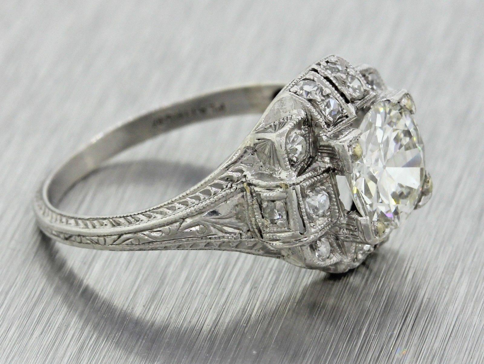 This is another exquisite stunning antique art deco platinum diamond engagement ring that can dated back to the 1920's. This ring's suggested retail price is $16,220.00 USD and was determined by UGS an independent appraisal company. This engagement