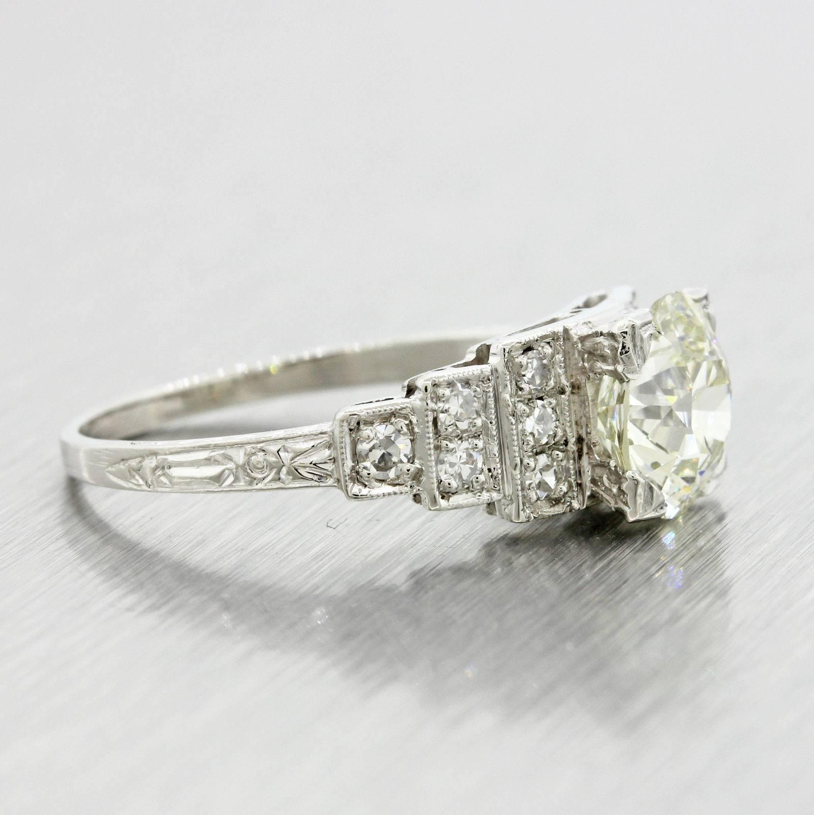 This is a beautiful Antique Art Deco diamond engagement ring that can be dated back to the 1920s. This rings diamond grades and estimated retail price of $15,000.00 USD was determined by world-renowned EGL USA; one of the most reputable diamond