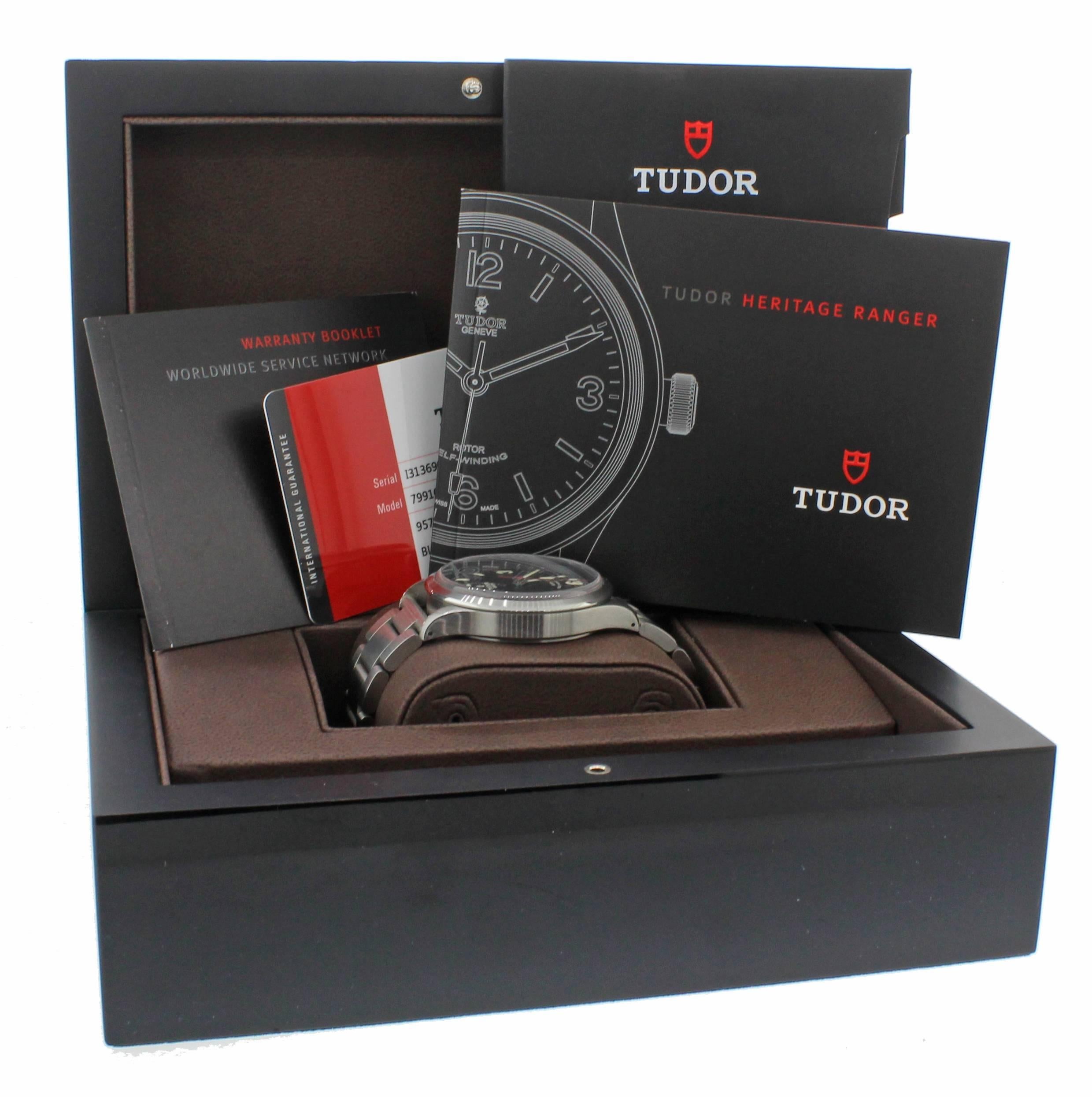 2015 Tudor Heritage Ranger 79910 Steel Black 41mm Watch. Complete with Original Box, Papers, Booklets and Hand Tags

Brand      Tudor (Guaranteed Authentic)
Model 	Black Ranger
Reference Number	79910

Serial Number 	I-Series (Originally purchased