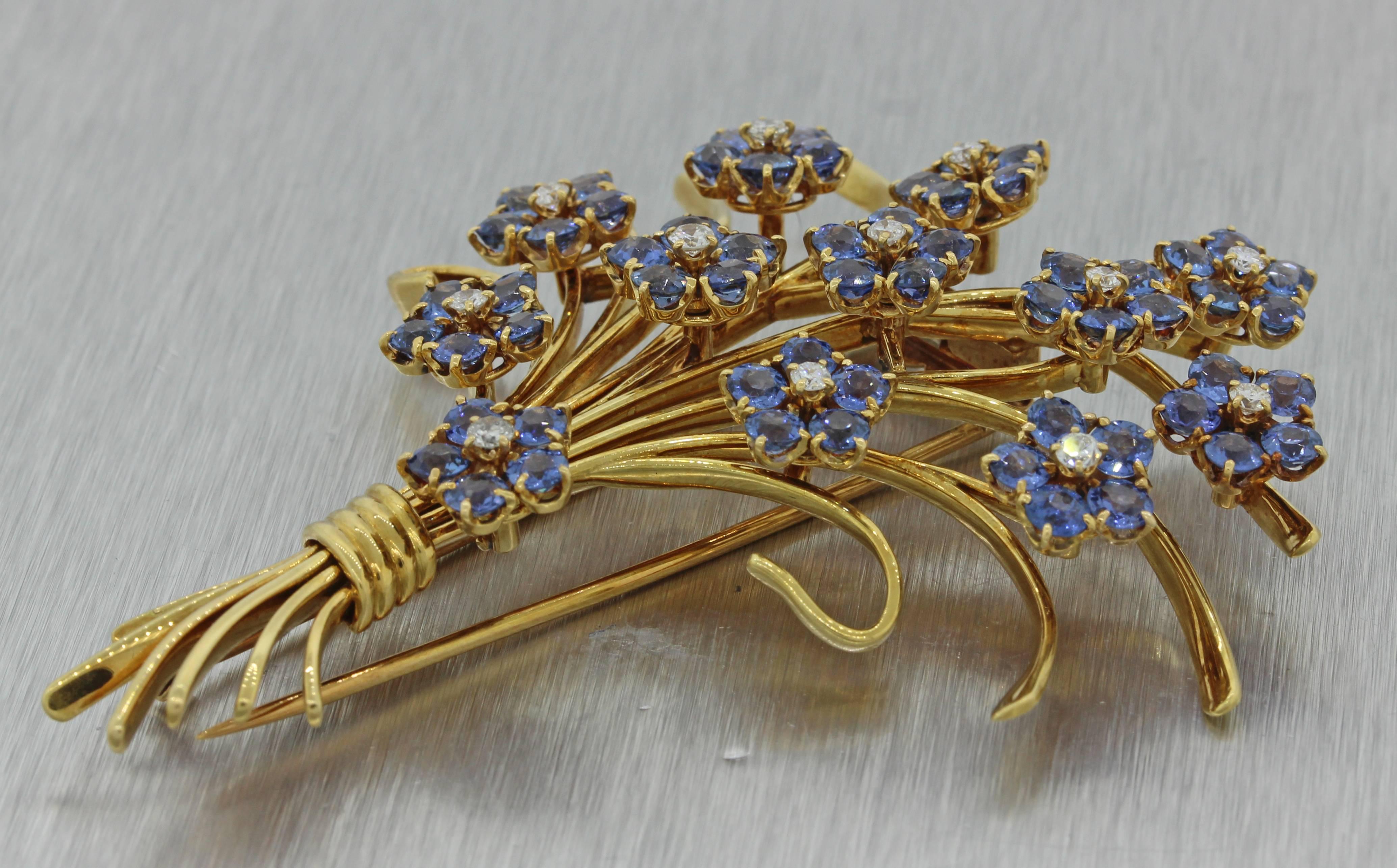 This is a a beautiful Vintage Estate Van Cleef & Arpels 18k Yellow Gold Diamond Sapphire Flower Bouquet Brooch Pin. It will come professionally packaged in a beautiful gift presentation box and our 30day money-back guarantee.

Dimensions 	3.00