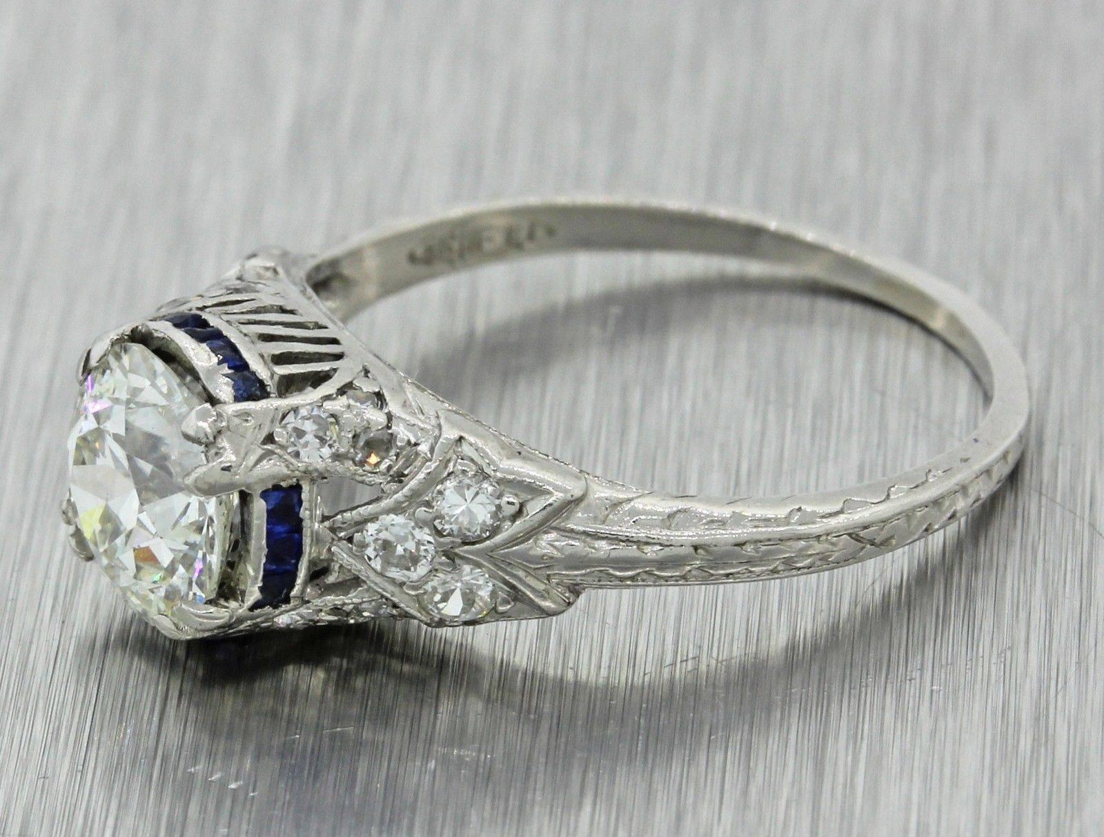 This is a beautiful 1920s Antique Art Deco Platinum 1.46ctw Diamond Sapphire Engagement Ring EGL. It has been certified by EGL and will come with the certificate. It will come in a lovely ring box for a perfect presentation and our unconditional 30