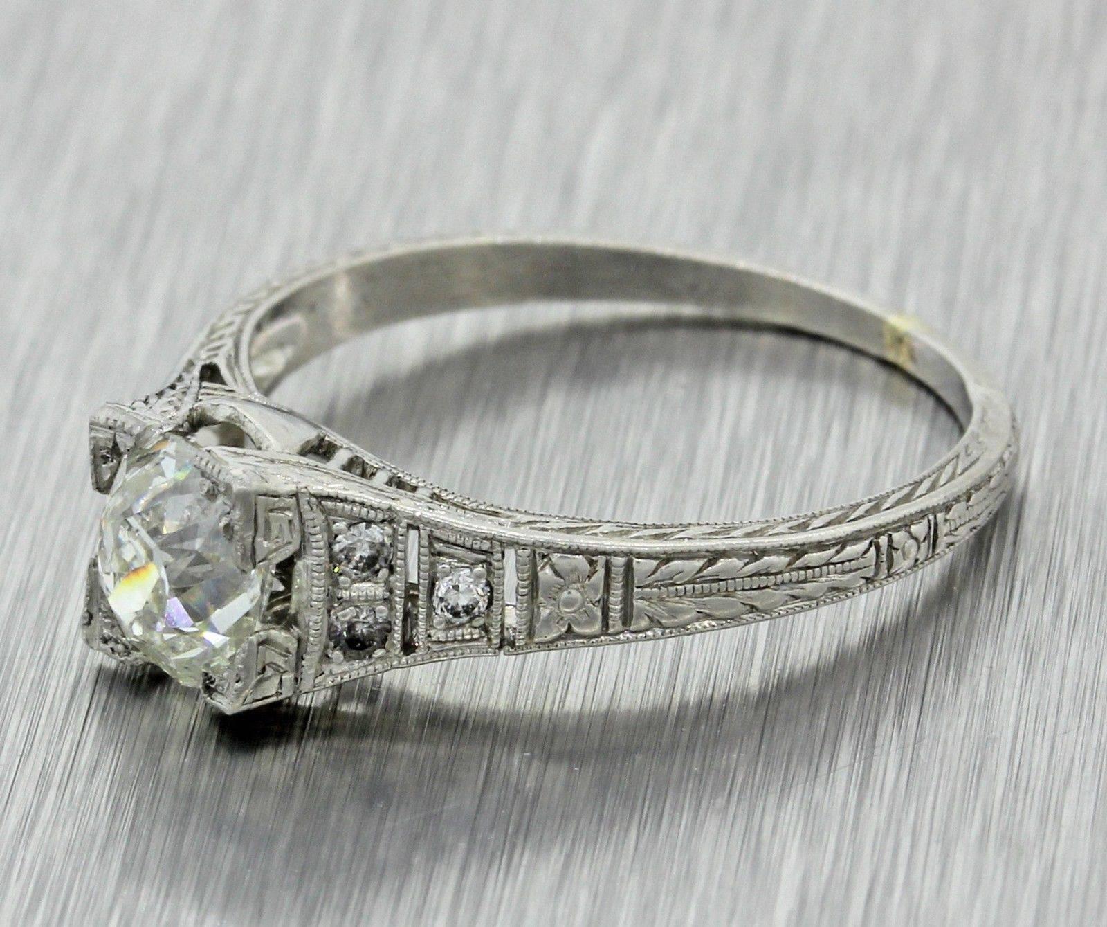 This is a 1940s Vintage Art Deco Platinum .95ctw Old Mine Cut Diamond Engagement Ring EGL. This ring suggested retail price is $4,700 USD. It will come in a lovely ring box for a perfect presentation and our unconditional 30 day money back return