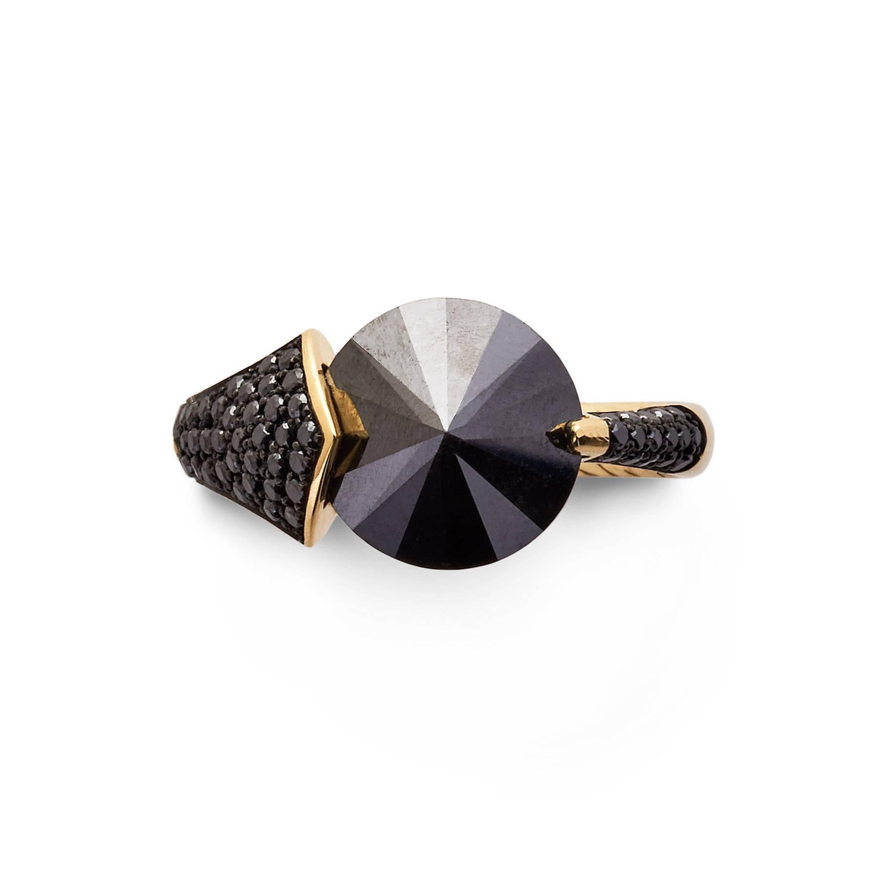 18ct yellow gold with a central black diamond weighing 4.98cts and 0.33ct black diamond pavé shoulders
Limited edition of five
Made in London

The Bear Claw Ring, like the Bear Claw Cuff, was inspired by an image of a wild black bear. Sharp and