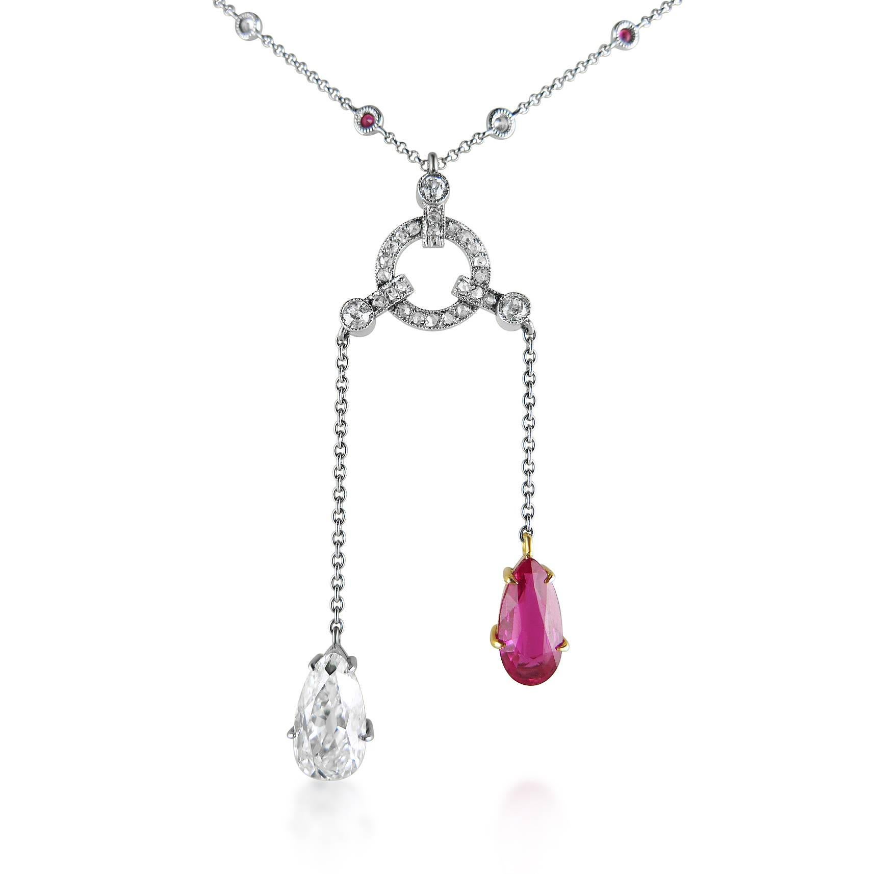 The pear-shaped ruby weighing 2.07cts, the pear-shaped diamond weighing 2.23cts with diamond-set circular supsension to the ruby and diamond-set neckchain, with Gem & Pearl Laboratory certificate nr. 13196 dated 9th September 2016 stating that