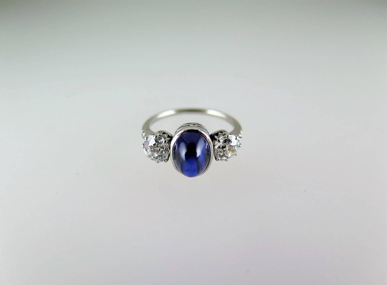 Round Cut Antique Cabochon Sapphire and Old Mine-Cut Diamond Ring For Sale