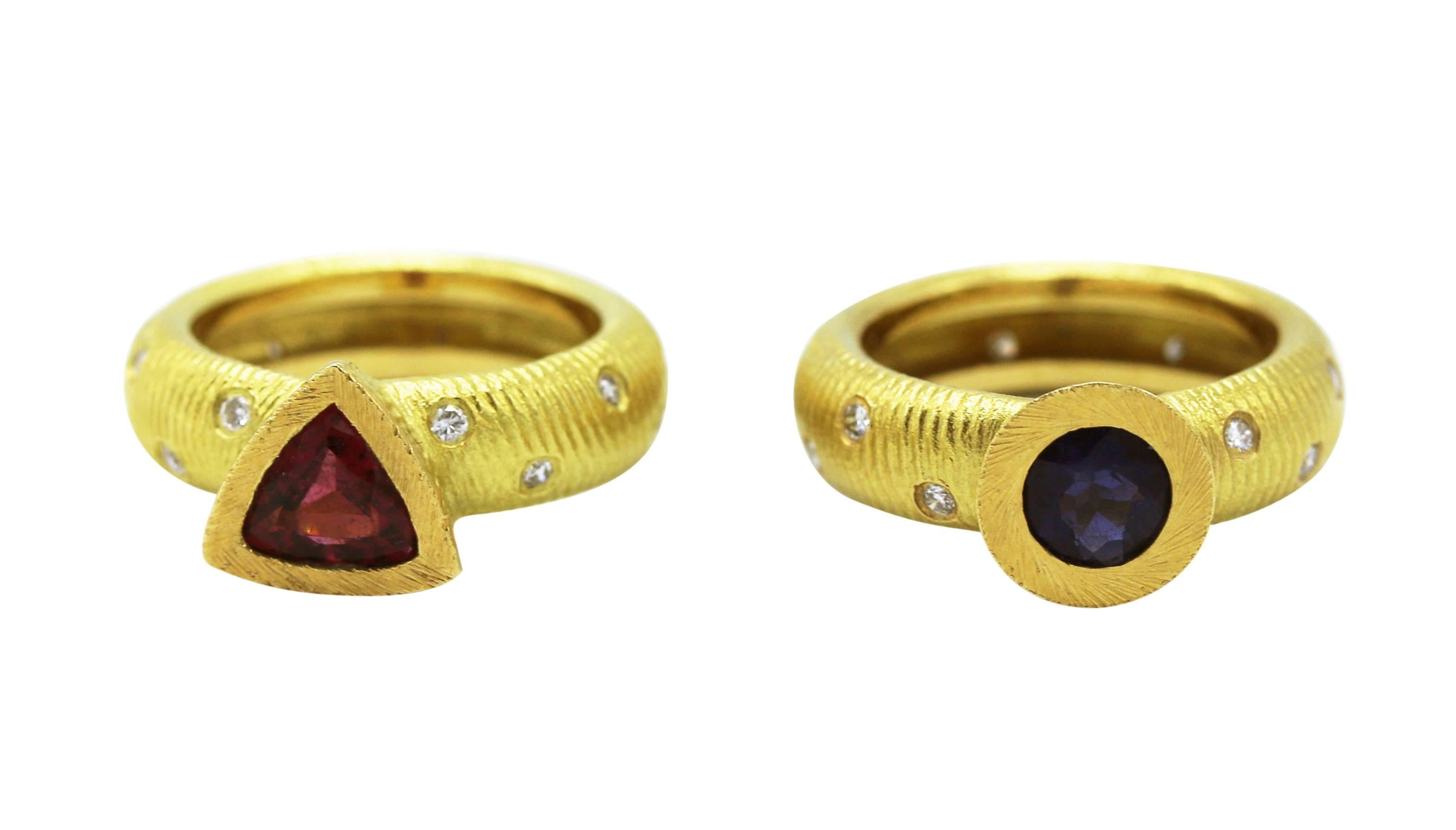 Beautiful pair of Paul Morelli rings, one bezel-set with a round sapphire, the textured gold band set with small round diamonds weighing approximately 0.20 carat, size 6 1/4, gross weight 10.3 grams, signed Morelli; the other ring of similar design
