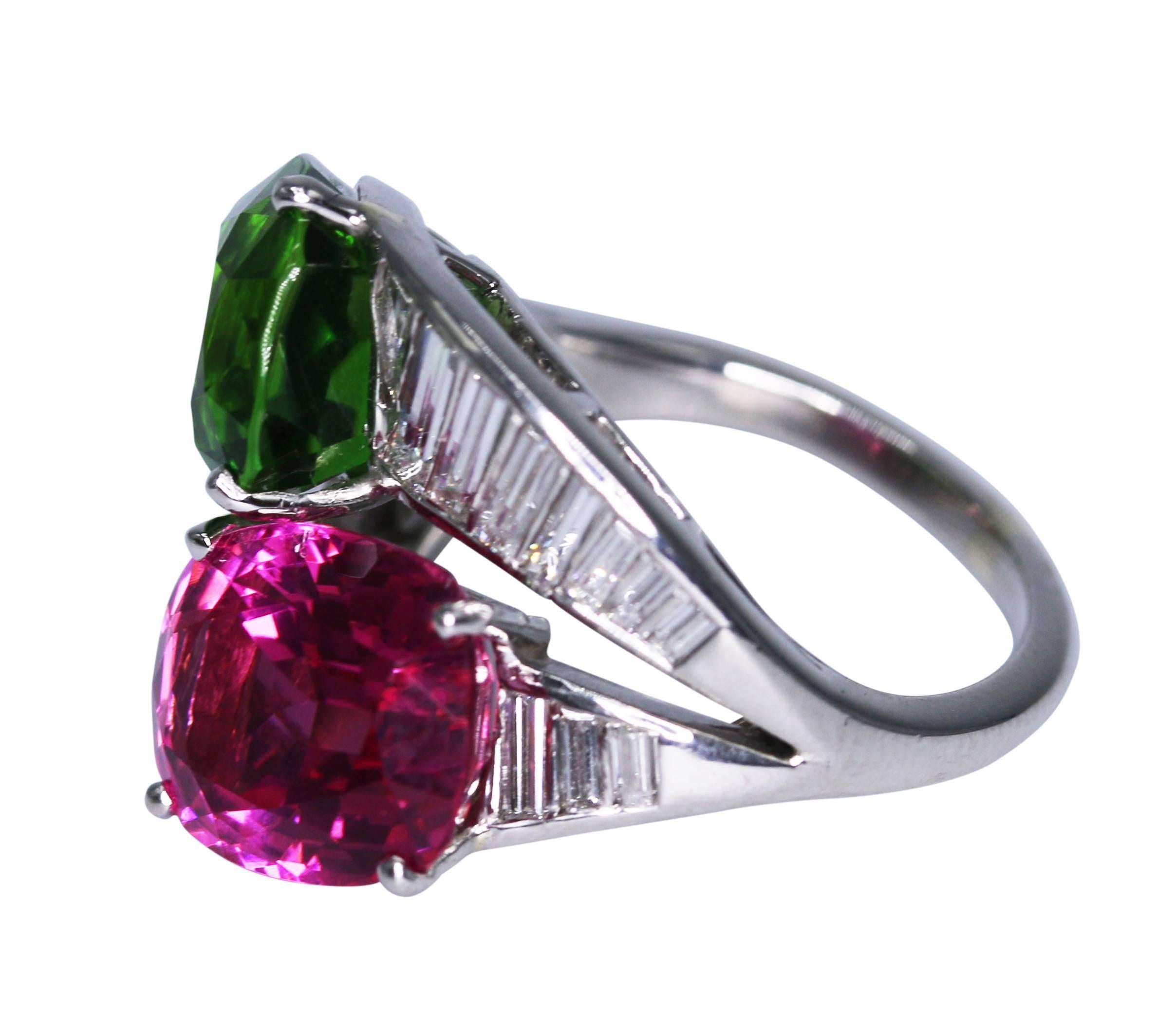 Platinum, gem quality tourmaline and diamond crossover ring, set with 2 large pink and green gem quality tourmalines weighing approximately 10.00 carats, accented by diamonds weighing approximately 1.20 carats, gross weight 11.9 grams, size 6 1/2,