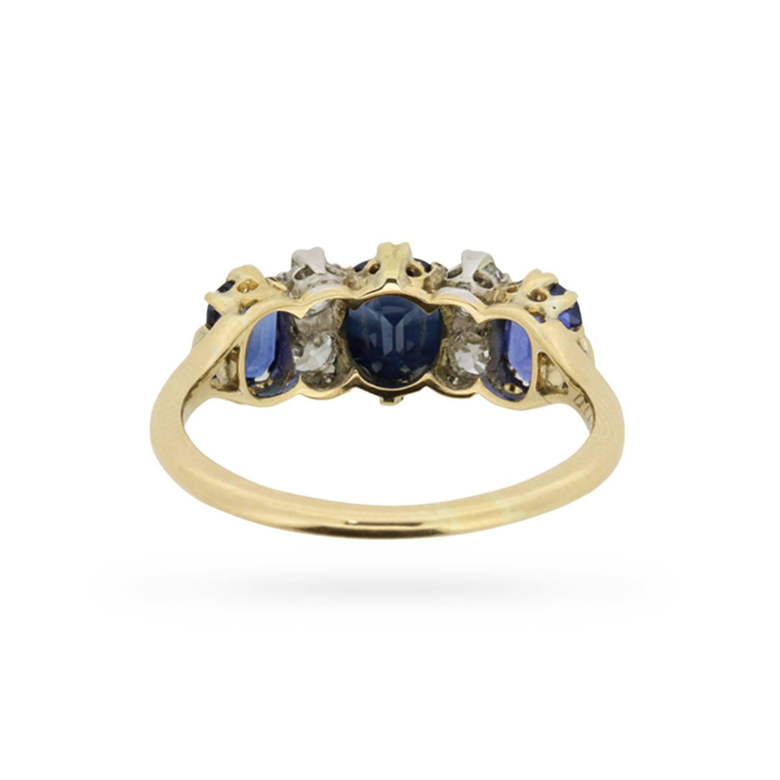 Women's or Men's Late Victorian Sapphire and Diamond Seven-Stone Ring, circa 1900s