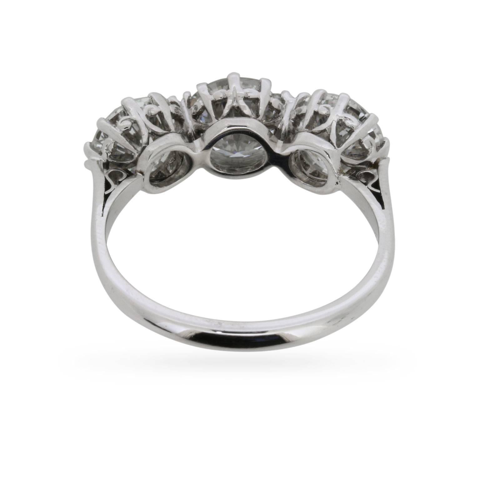 Women's or Men's Late Art Deco 3.50 Carat Transitional Cut Diamond Three-Stone Ring, circa 1930s
