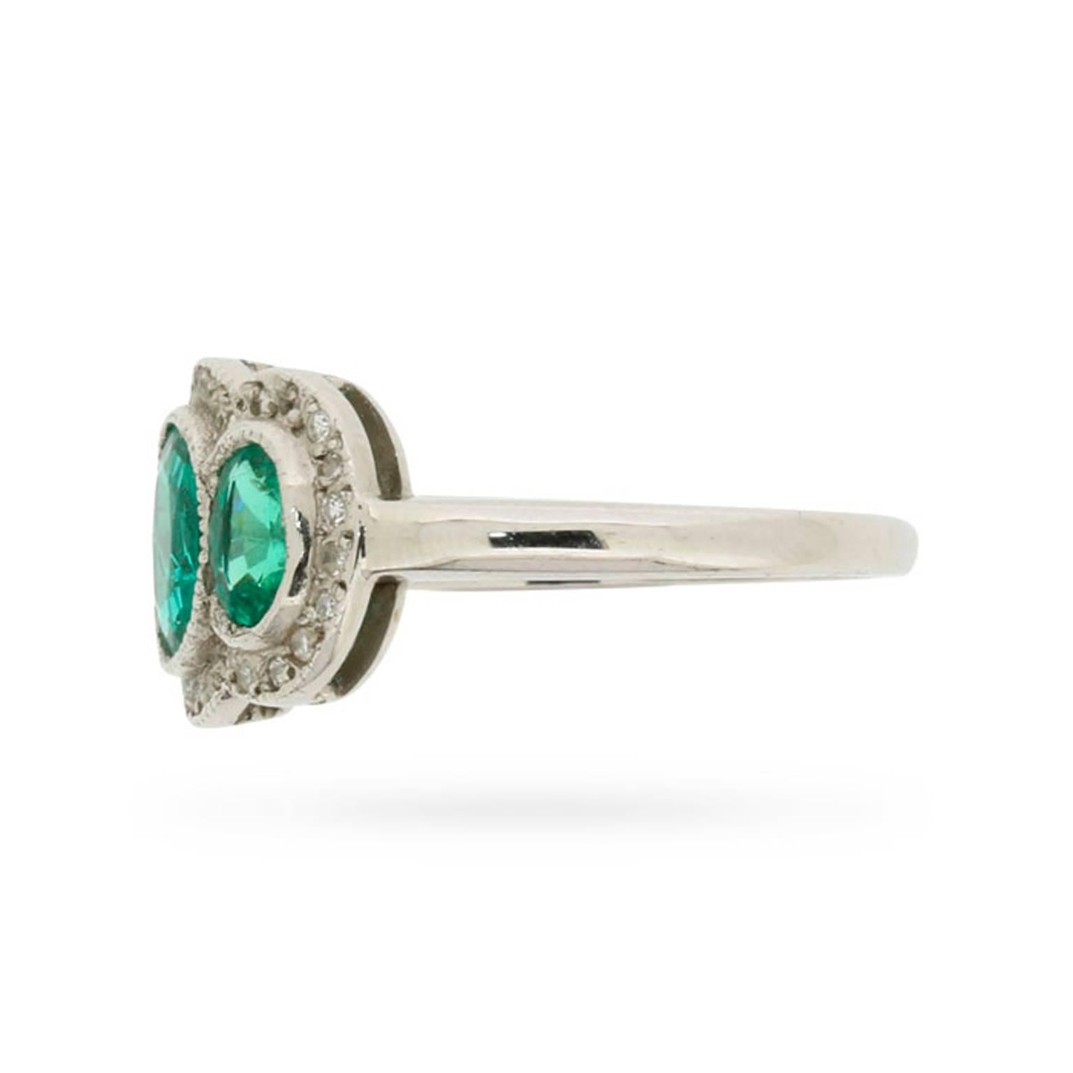 Vintage Triple Halo Emerald and Diamond Ring, circa 1950s In Excellent Condition In London, GB