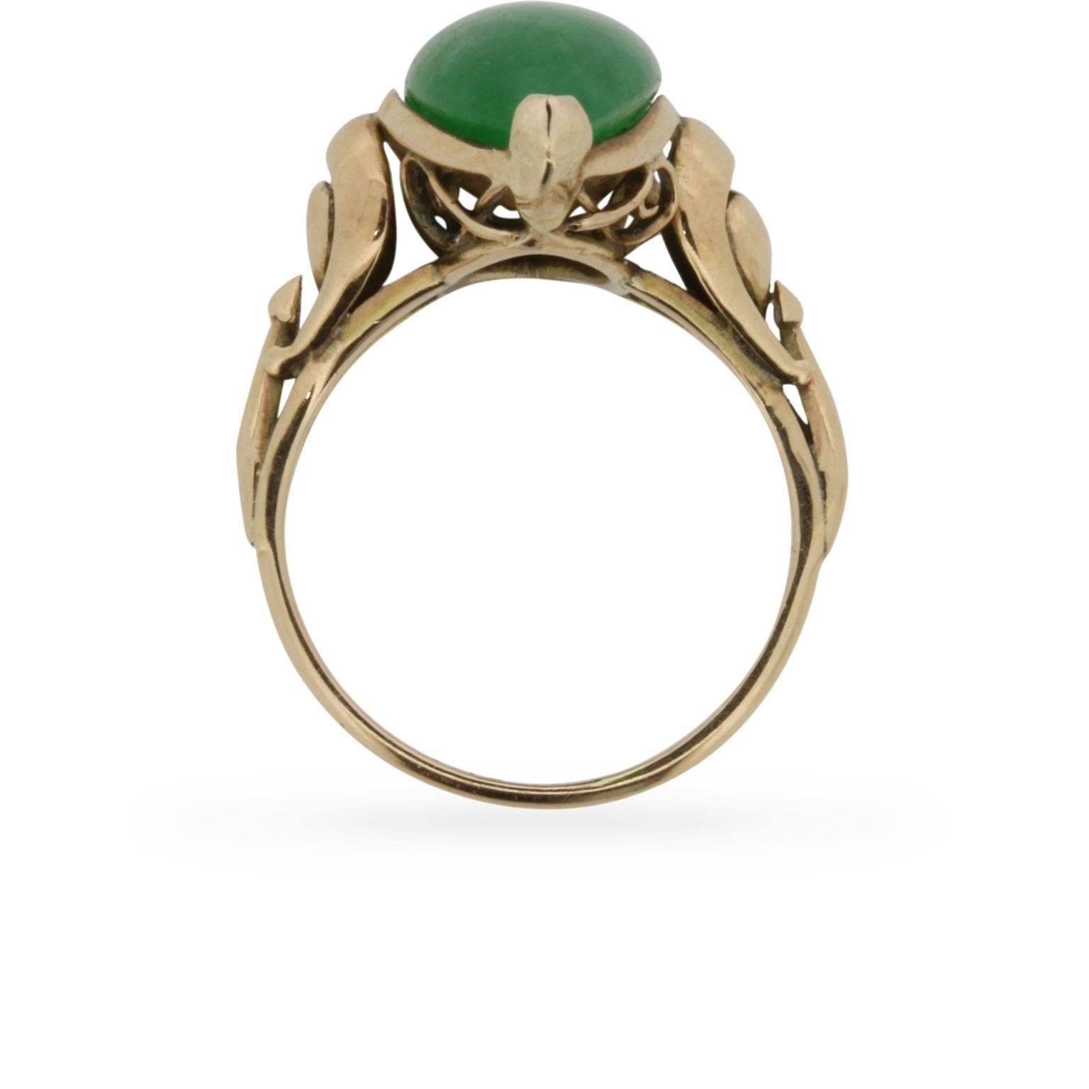 This beautiful, natural Jade, marquise cut, is set within a 14 carat rose gold mount. It dates back to the 1920s and is all handmade. The stone has a rich green colour to it, which is highlighted wonderfully by the rose gold band and shank.

The