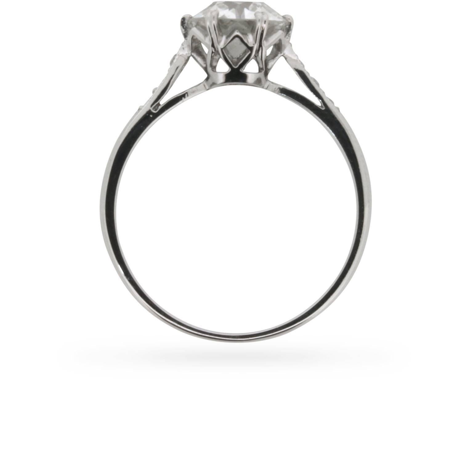This stunning and elegant solitaire ring has a beautiful 1.51 carat diamond as the main attraction. The old cut diamond would have been hand cut, and hand set within the crafted mount. The stone has been certified as a H colour and clarity VS1. It
