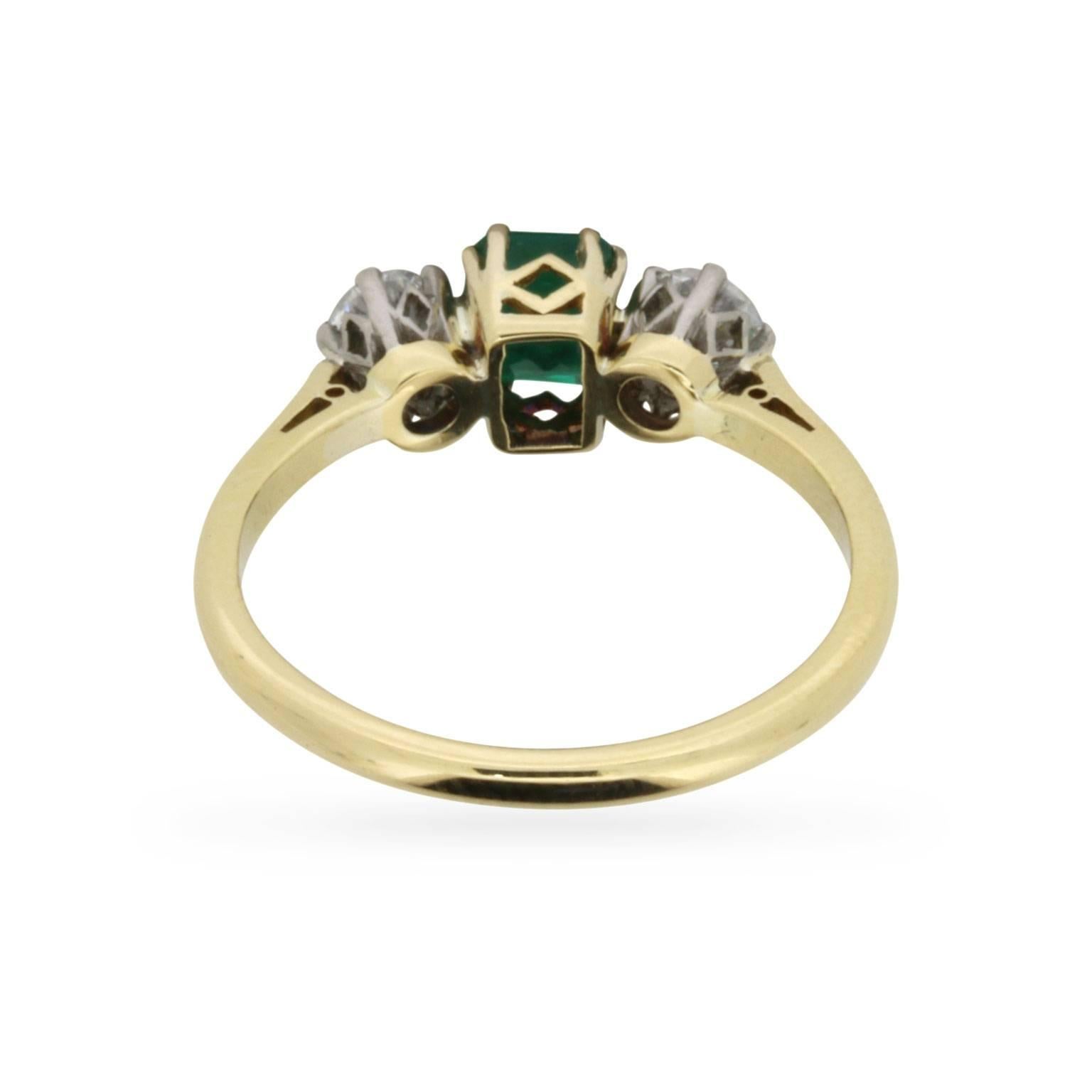 Women's or Men's Art Deco Emerald and Diamond Three-Stone Ring, circa 1920s