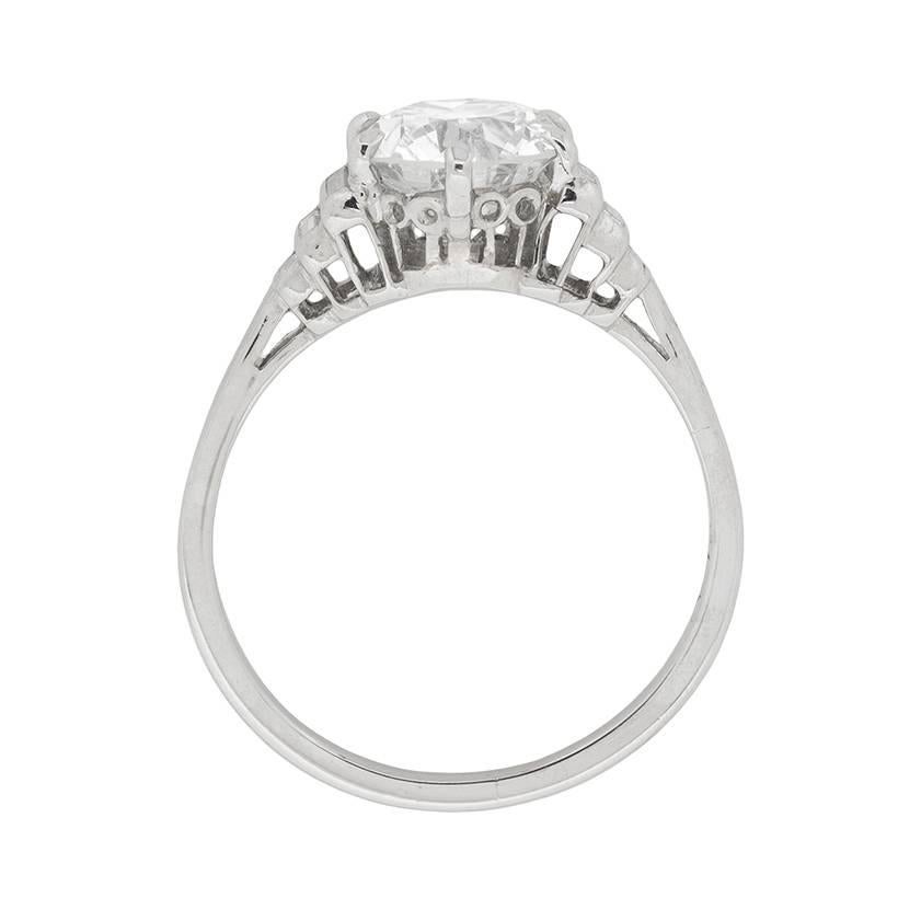 This absolutely fabulous diamond solitaire ring dates back to approximately 1920. The centre stone is a beautiful round brilliant weighing 2.12 carat. It has been certified by the world renowned GIA, and given a colour grade of H and clarity SI1. On