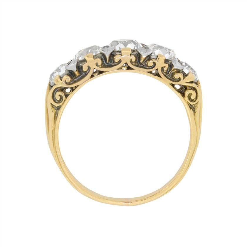 This stunning five stone ring dates back to the Victorian era and has a combined carat weight of 2.30 carat. Three of the stones which are central, each weigh 0.60 carat, whilst the two on either outer edge weigh 0.25 carat. Expertly set in between