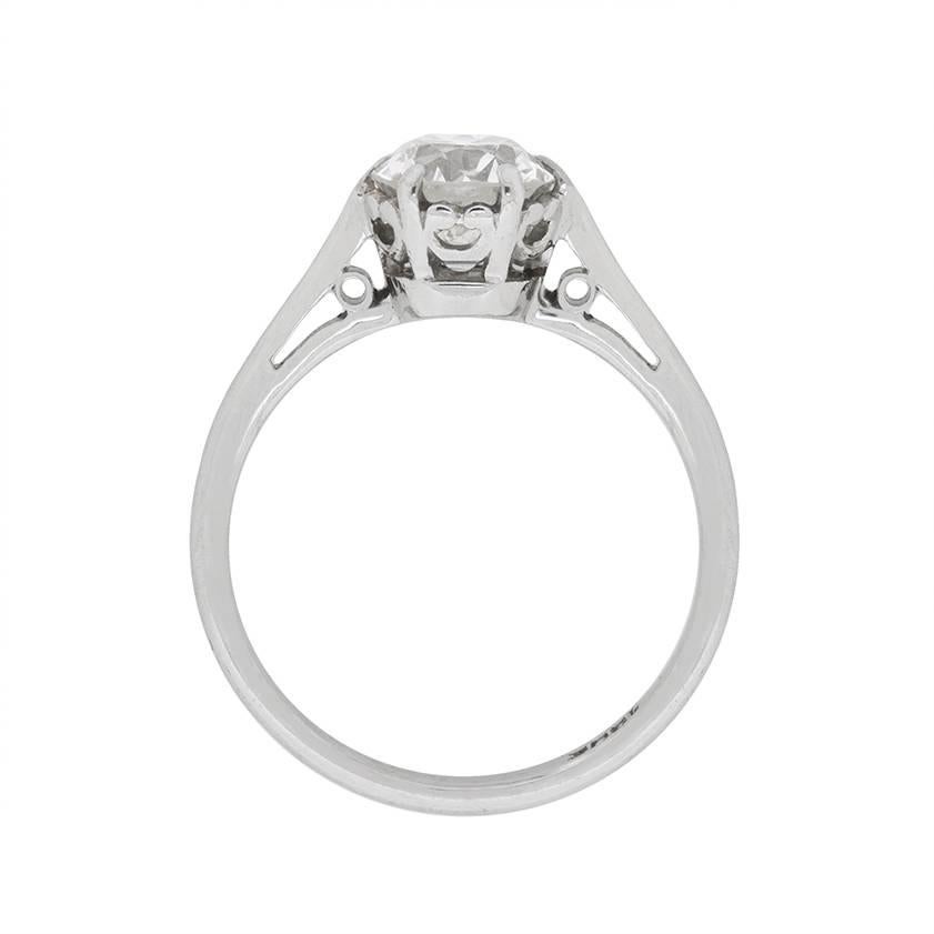 This stunning Art Deco engagement ring is a classic solitaire, highlighting a beautiful transitional cut diamond. It has been certified as H in colour and VS1 in clarity by independent certification company EDR. The stone weighs 1.33 carat and sits