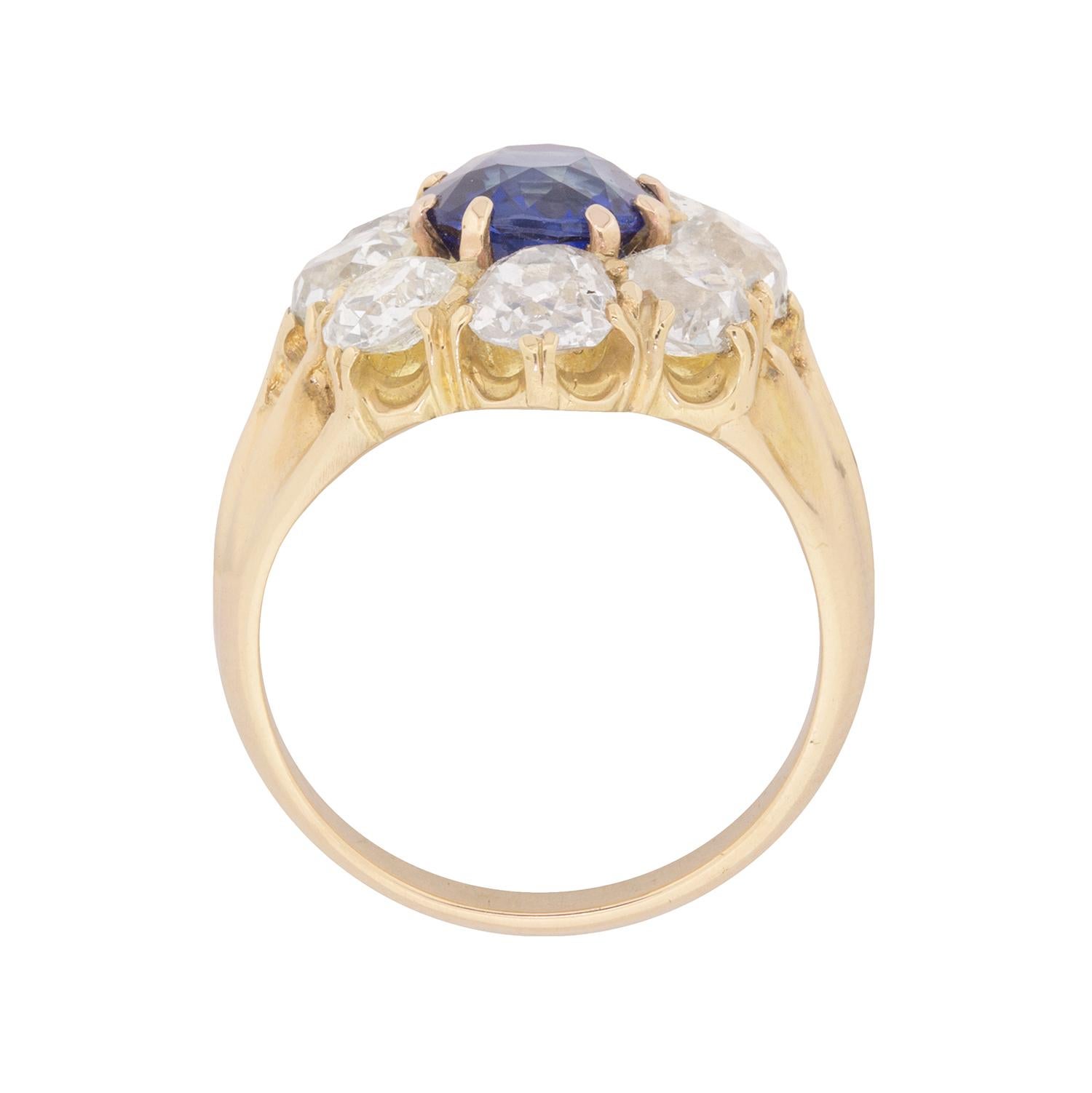 This stunning Victorian cluster ring features a beautiful deep blue sapphire in the centre. It is a natural stone, with no evidence of treatment, weighing 2.18 carat. It is haloed by a ring of hand cut, old cut diamond s, which total 4.00 carat.