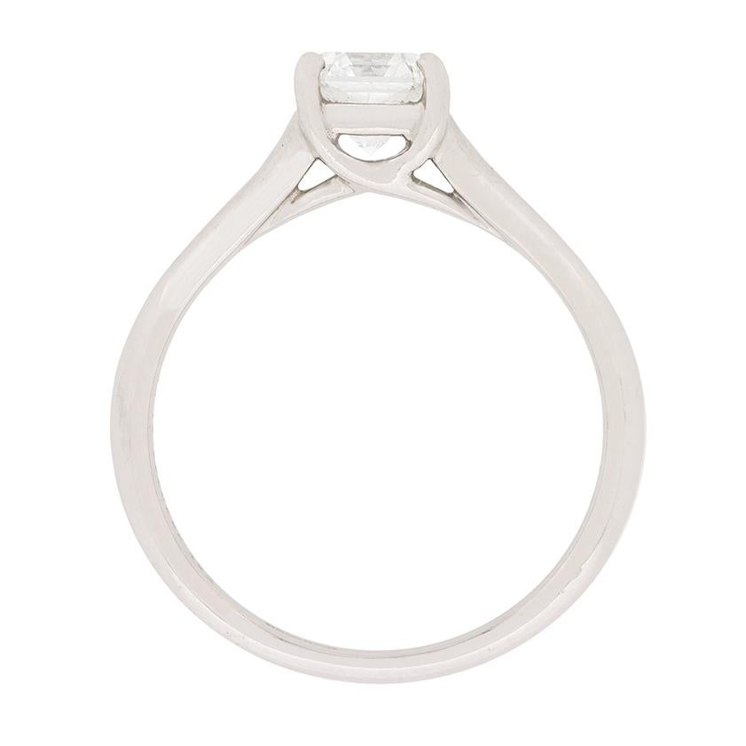 A classic Tiffany & Co diamond solitaire engagement ring. The diamond is a Lucida cut weighing 0.73 carat. It has been estimated as a H in colour and VS2 in clarity. The band is made of platinum and has the original Tiffany & Co makers marks. It