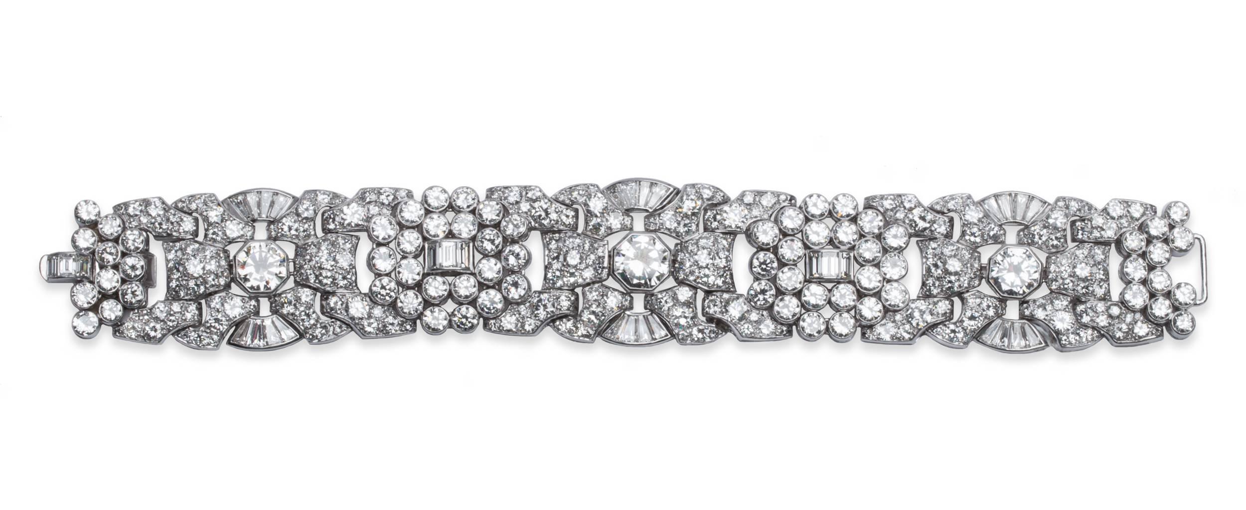 Art Deco Diamond and Platinum Bracelet. The bracelet has French assay hallmarks for platinum, 50.00 carat total diamond weight, it is 7 inches long and 1 inch wide.
